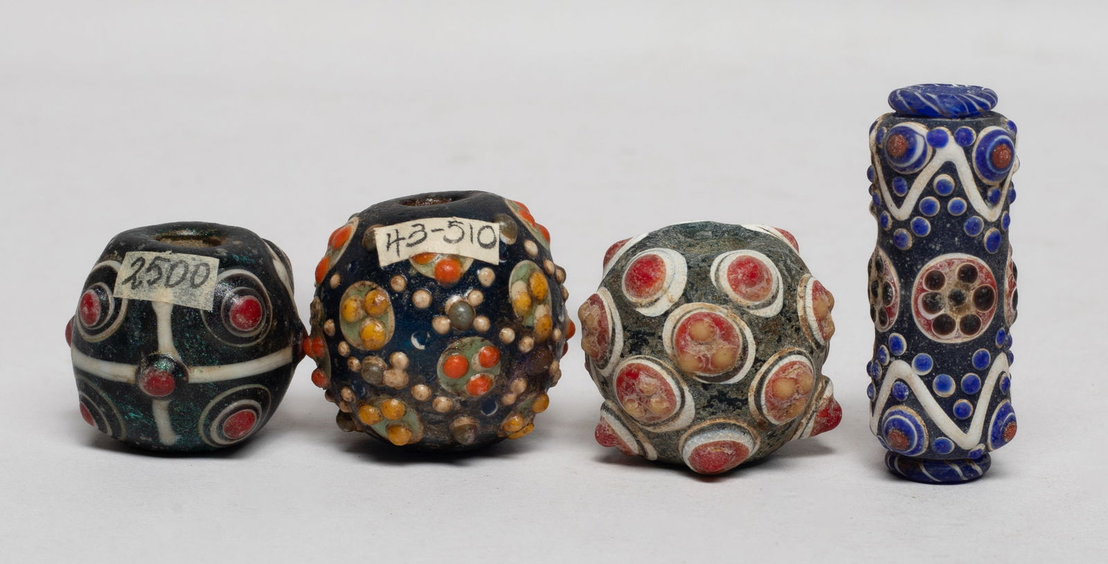 Estate Chinese Export Large Glass Beads: Set of four large Chinese glass beads. Approx. 1.83*0.77 inch (longest bead).