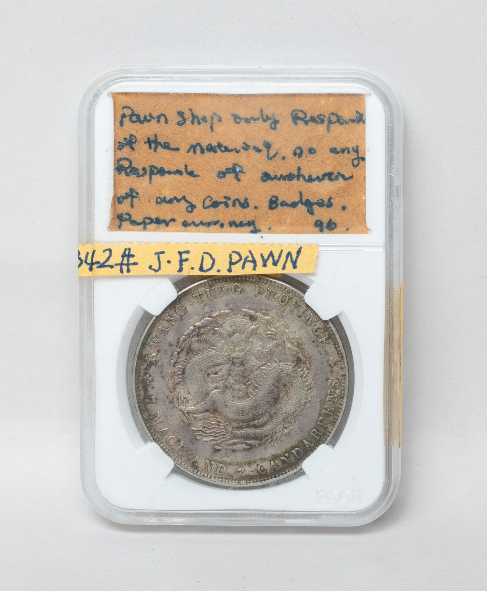 Estate Chinese Export Silver Coin: Chinese silver coin, one side marked KWANG TUNG PROVINCE 7 MACE AND 2 CANDAREENS, with case. Approx. 1.5 inch D (coin size). The Estate of the Tierney & Son. AZ. 2006.