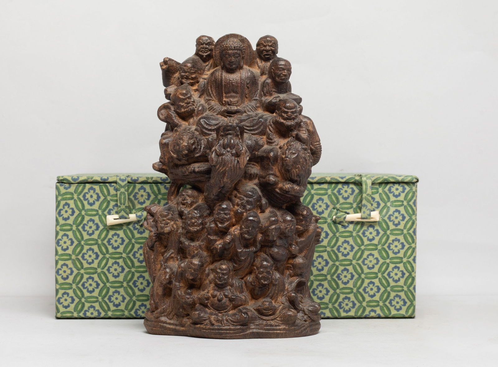 Vtg. Chinese Export Agarwood Sculpture: Featuring Buddha flanked by the Eighteen Luohans, a tiger, a lion, a dragon and a deer, the main Buddha sits at the center with a serene expression, each Luohan carved in a different pose. Approx. 835