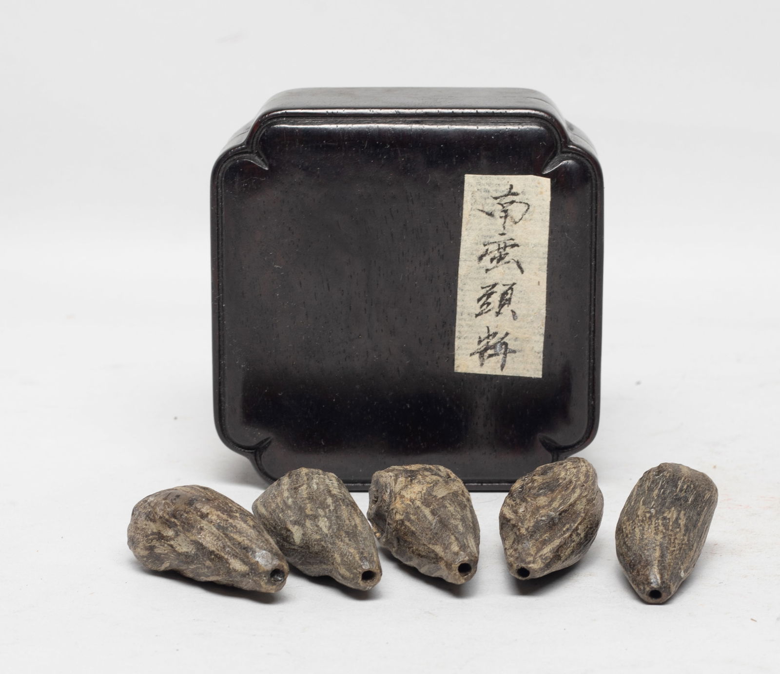 Chinese Export Agarwood Pendant Beads w/ Box: Set of five Chinese agarwood carved nugget beads, with box. Approx. 37 gram (total wood weight). The Estate of the Store Closed Sale, K-town, Los Angeles. 2022.