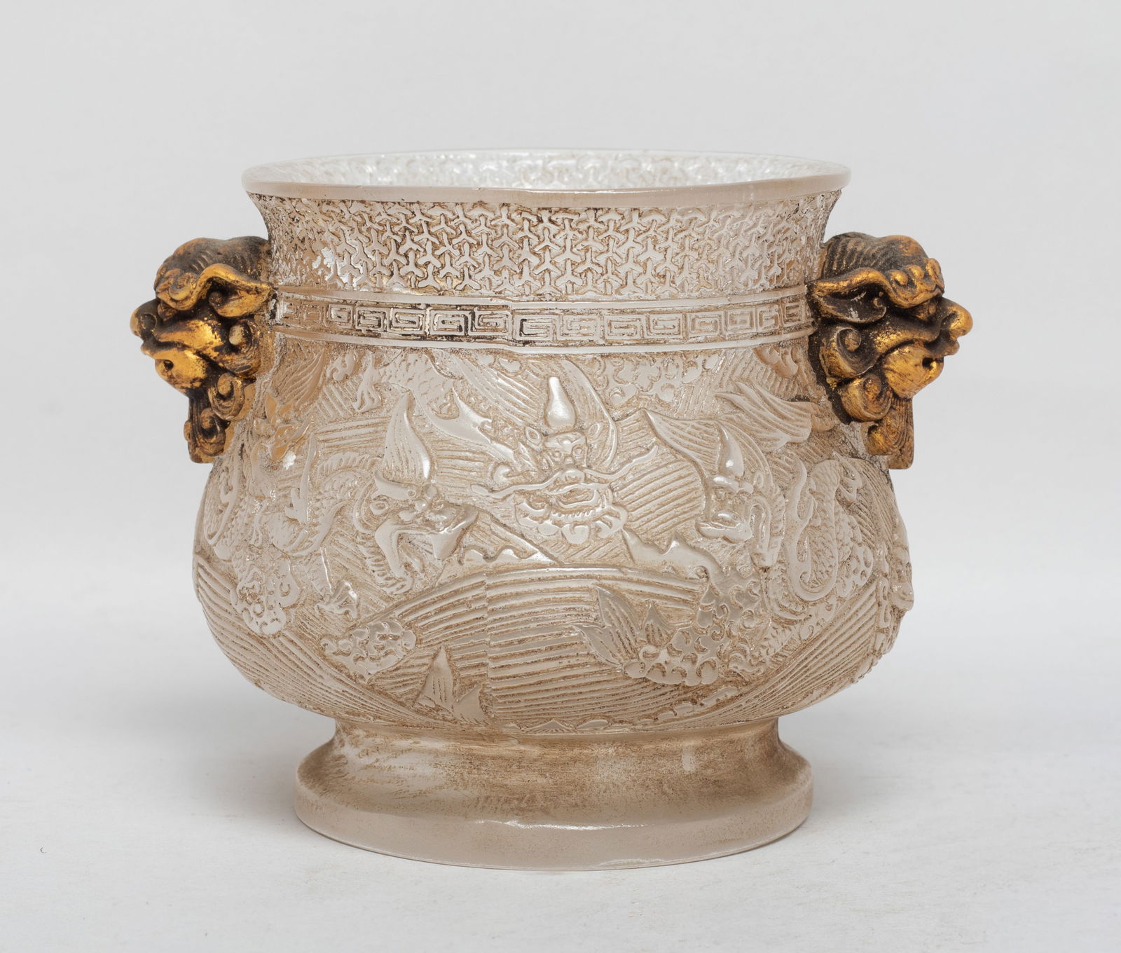 Chinese Export Peiking Glass Censer: The censer exterior carved with dragons sinuous over foaming waves, flanked by two raised beast mask handles. Approx. 5*4.2*3.9 inch. The Estate of the Store Closed Sale, DTLA.