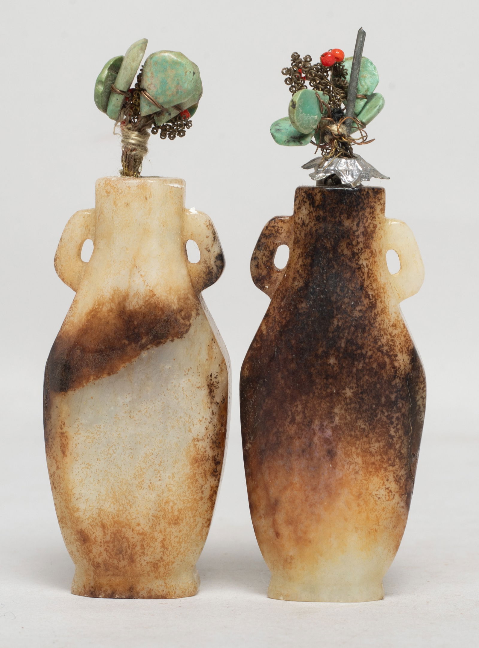 Two Chinese Jade Small Bonsai Vases: Two Chinese russet jade carved small bonsai vases, decorated with stone carved flowers. Approx. 3.25*1.1*0.6 inch (larger).