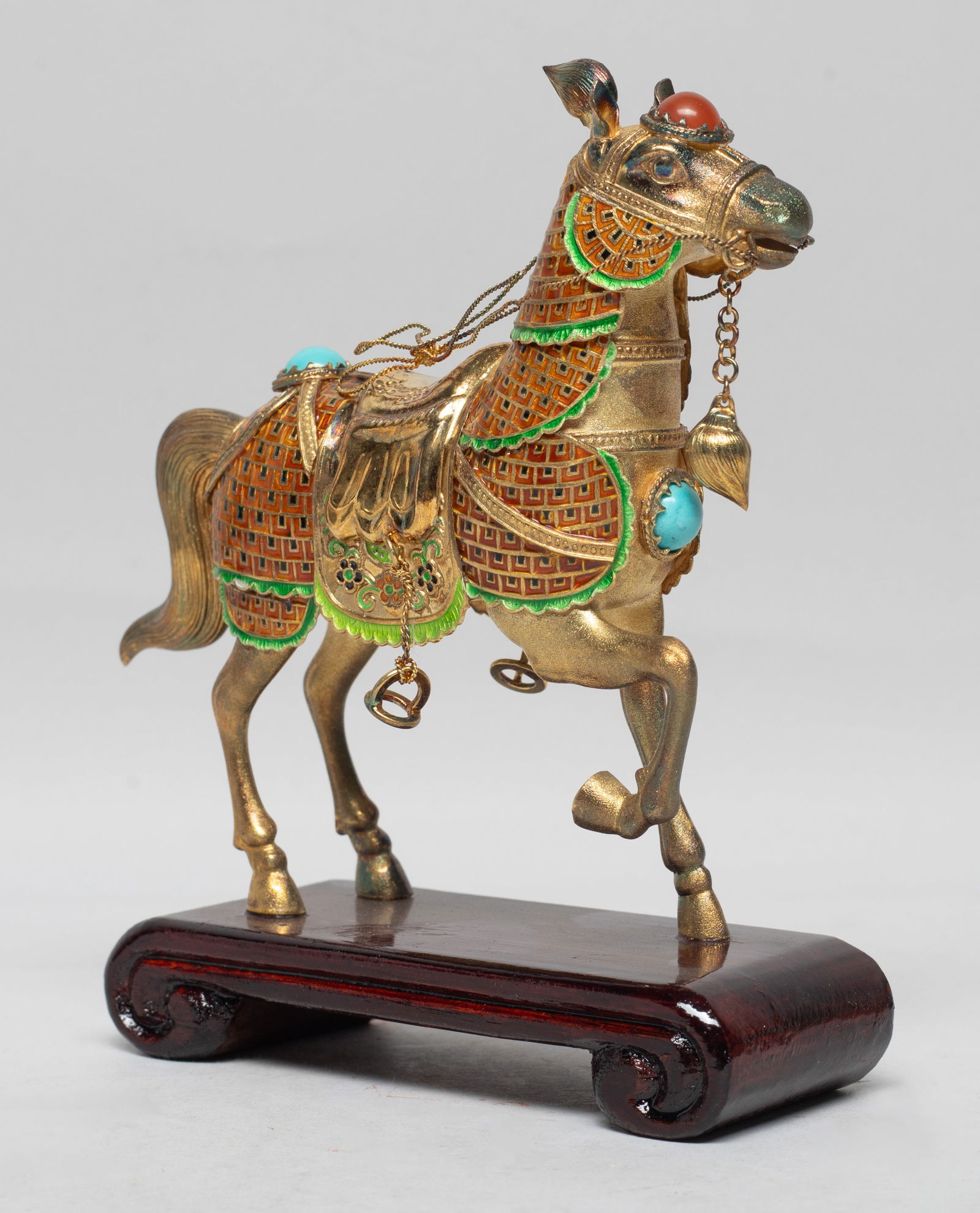 Chinese Gold on Sterling Silver Sculpture: Chinese gold on sterling silver sculpture of standing horse form, wearing an armour applied in green, brown and black glaze, inlaid with blue and red stone. Approx. 5*4.5*1.5 inch (w/ base). The Estat