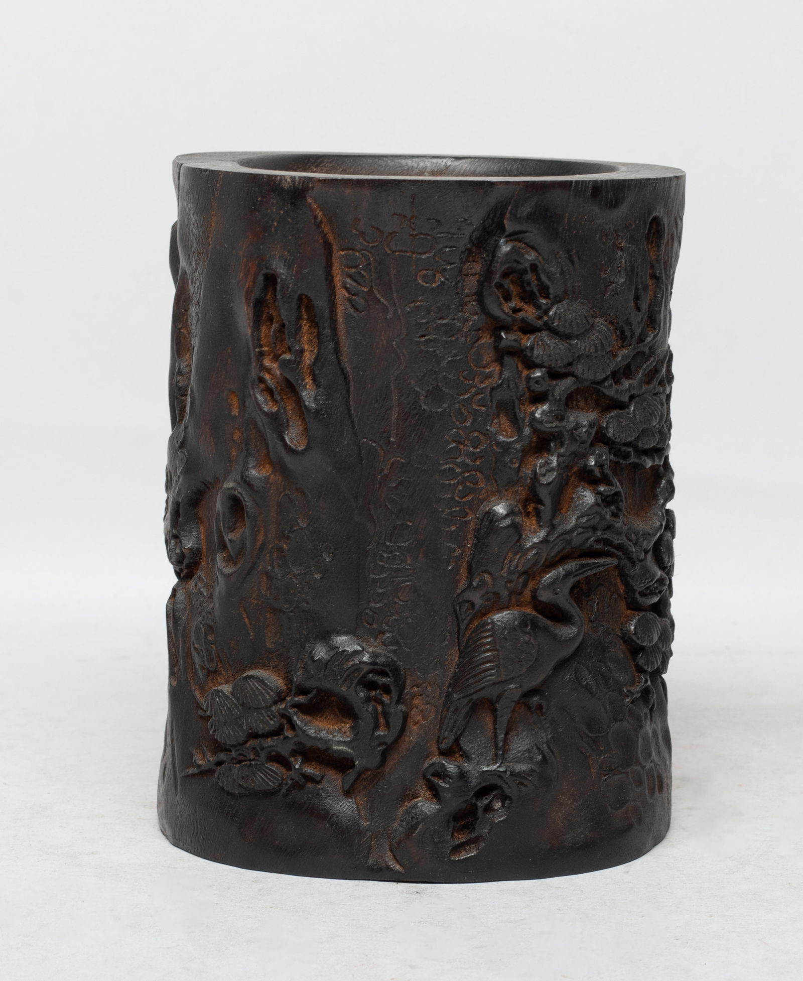Rare Chinese Agarwood Carved Brush Pot: Of cylindrical form, the exterior carved with a pair of cranes among gnarled pine tree branches. Approx. 4.5*5.6 inch. The Estate of the Store Closed Sale, Los Angeles. 2022.