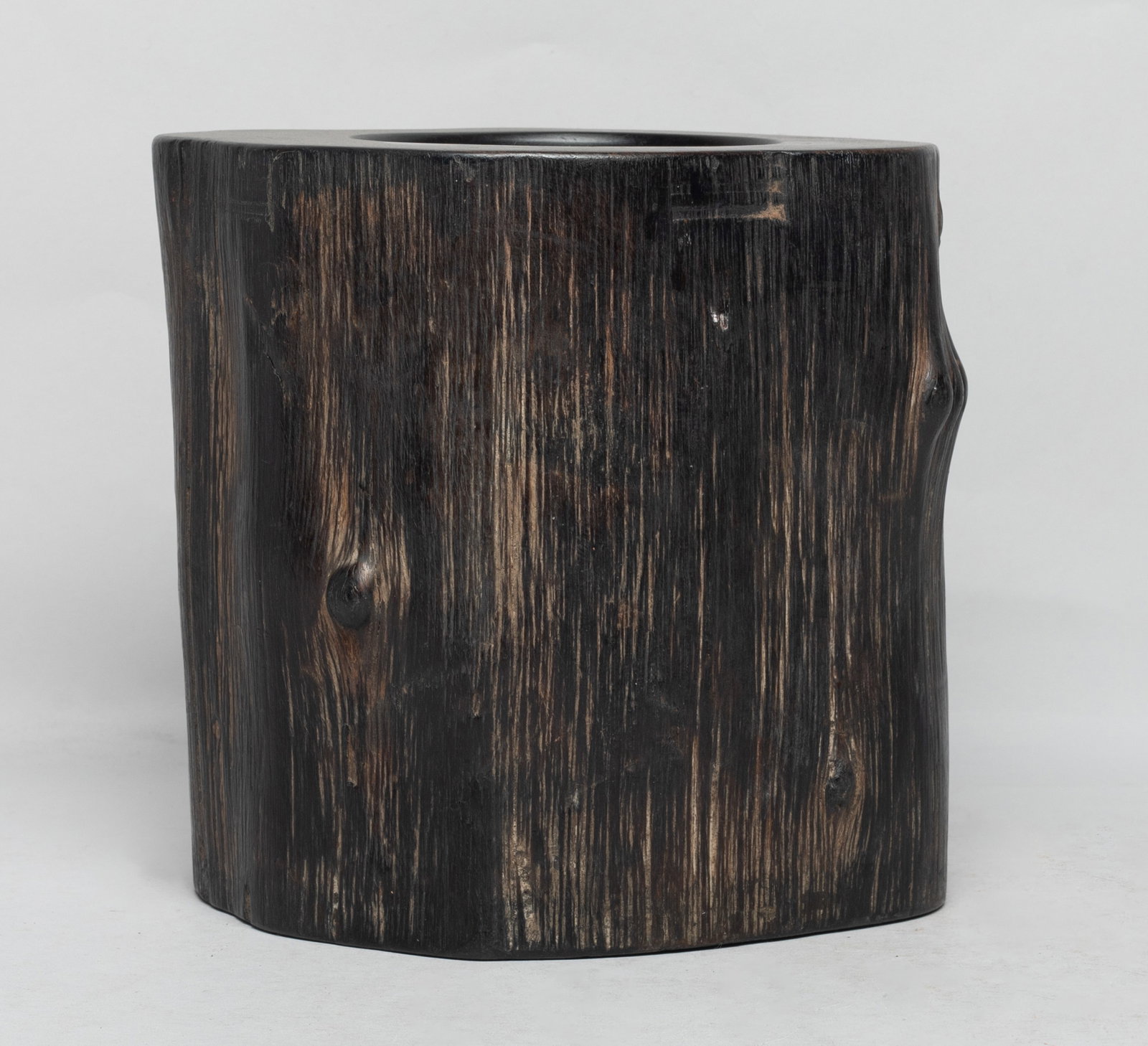 Heavy Chinese Tan Wood Brush Pot: Heavy Chinese tan wood brush pot of gnarled trunk form. Approx. 7.1*6*6.7 inch. The Estate of the J. W Town. HK. 2003.