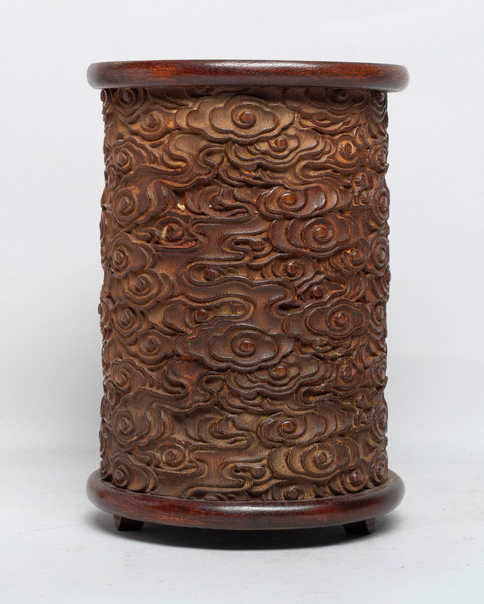 Tall Chinese Export Wood Brush Pot: Of cylindrical form, the exterior carved with scrolling clouds. Approx. 5.27.5 inch. The Estate of the Store Closed Sale, Los Angeles. 2022.