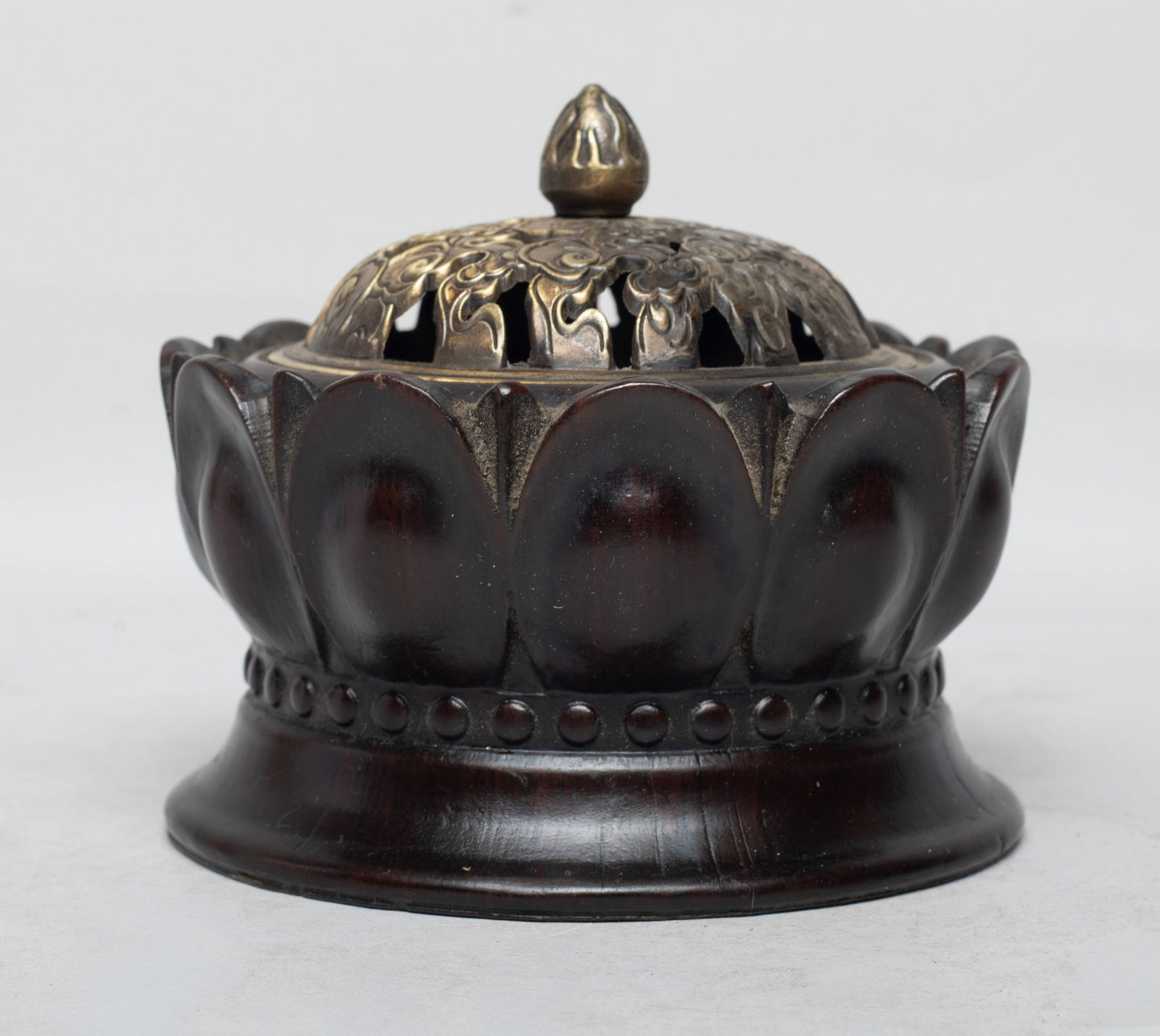 Estate Chinese Wood Censer w/ Brass Cover: The censer carved of lotus form with a splayed foot, the brass cover cast in openwork with scrolling clouds with a bud shape knob. Approx. 4.1*3.7 inch. The Estate of the Store Closed Sale, DTLA.