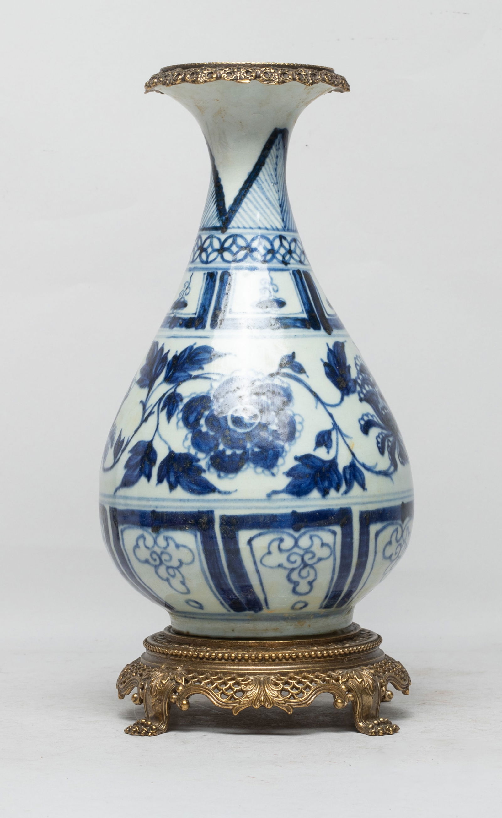 Chinese Export Porcelain Decor Vase: Of pear shape rising to a waisted neck and a flared rim, the exterior painted with undulating leafy lotus sprays, under bands of leaves and lappets, above a band of lappets, with metal cast mouthrim a