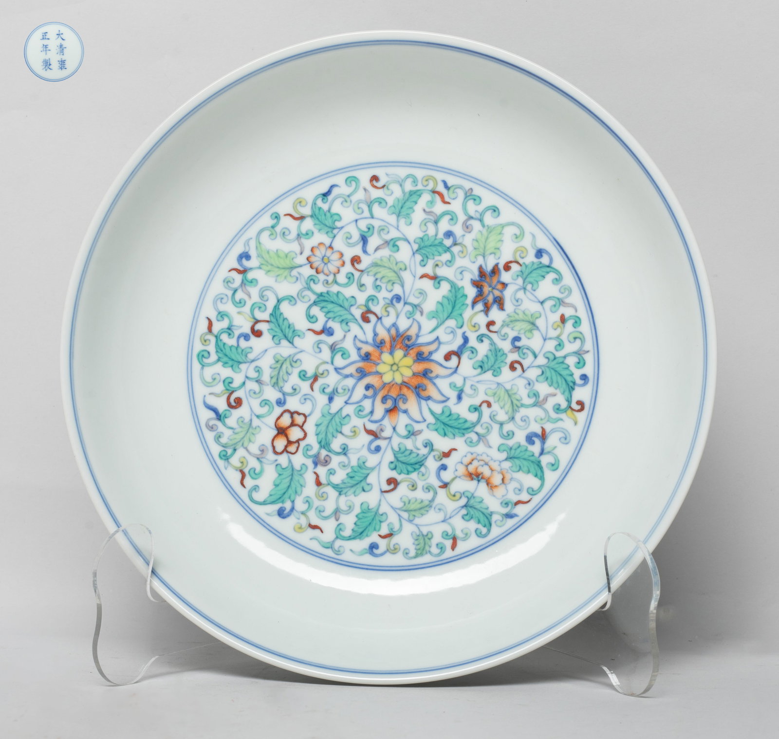 Chinese Export Douchait Porcelain Plate: The plate interior centre and exterior decorated with dense leafy lotus foliage, the bottom marked with six characters enclosed in double circles. Approx. 8.3*1.7 inch.