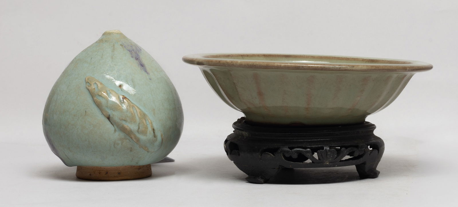 Chinese Longquan Porcelain Plate, Jun Type Peach: Of peach shape carved with two raised leaves, the exterior covered in crackled pale bluish gray glaze with purple splashes, the plate interior centre carved with two fish, overall covered in celadon g