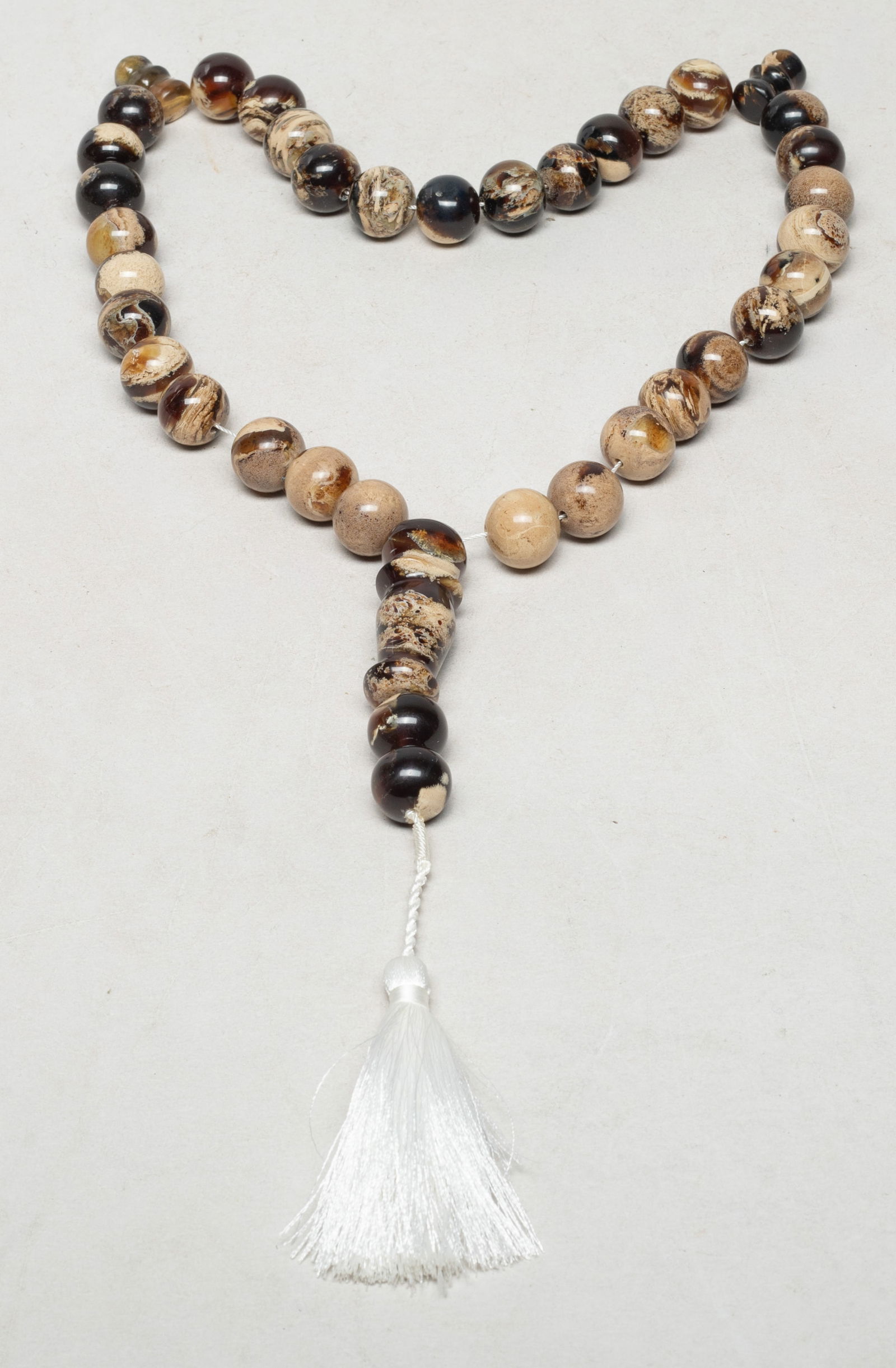 Estate Long South Asian Root Amber Prayer Beads: Collectible South Asian root amber carved prayer beads. Approx. 97 gram (total bead weight), 1.95*0.75 inch (largest bead).