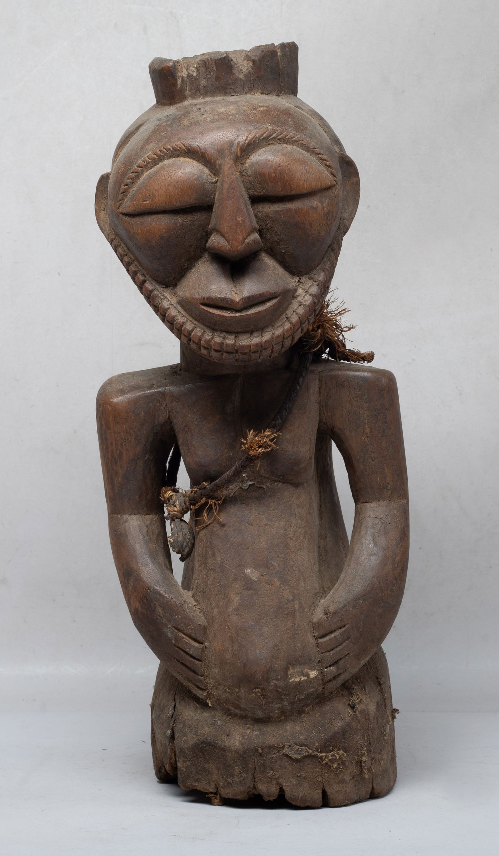 Large Antique African Wood Sculpture: Large African type wood figurine sculpture carved of abstract style. Approx. 16.2*6.7*5.3 inch.