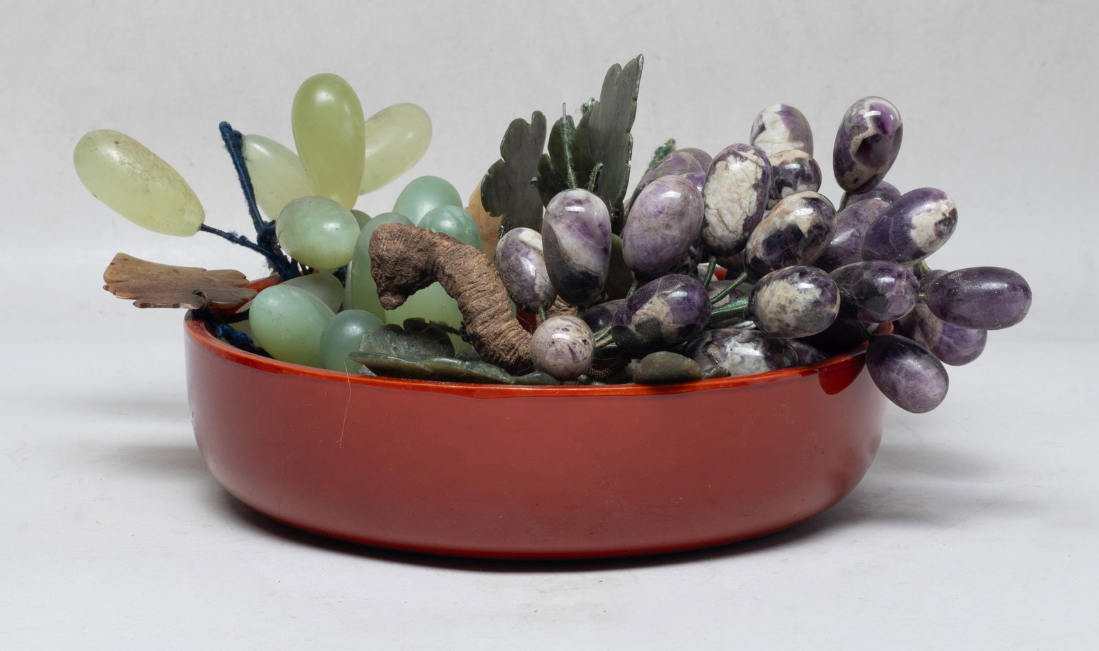 Estate Chinese Export Jade, Stone Sculptures: Chinese green and purple stone carved grape sculptures with jade leaves, with a bowl. Size varies.