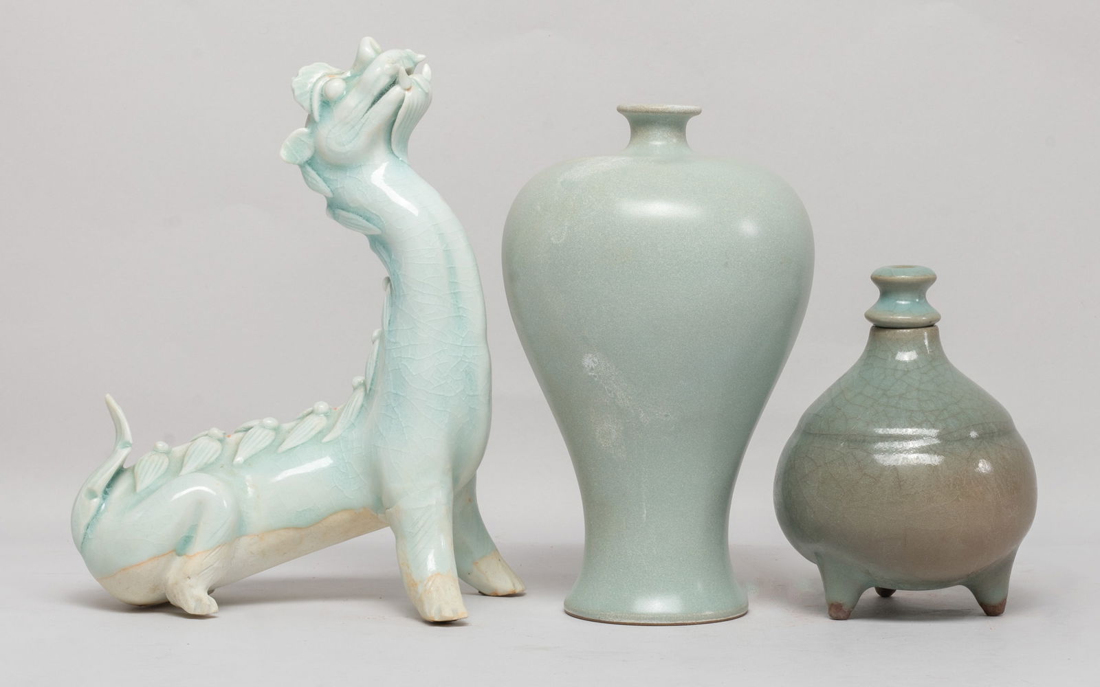 Set Chinese Export Porcelain Wares: Set of three soft celadon glazed porcelain pieces, including a vase, a censer, and a beast sculpture, the censer and beast body suffused with glazed crackles. Approx. 7.3*5.2*3.1 inch (beast size).