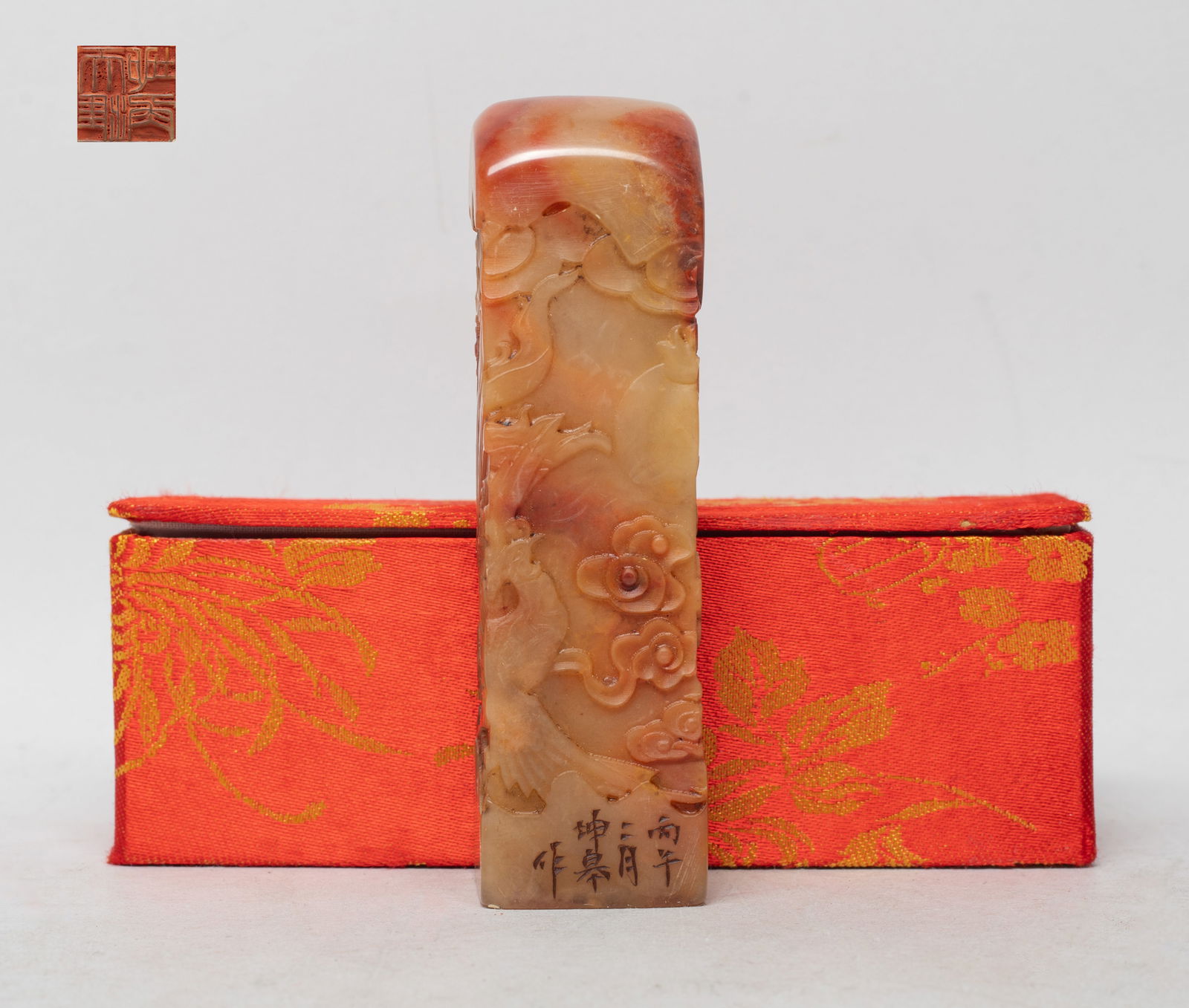 Estate Chinese Translucent Shoushan Stone Seal: Of tall square section, the sides carved with a dragon and a phoenix amidst clouds, inscription on one side, with box. Approx. 4.17*1.17*1.15 inch (seal size).
