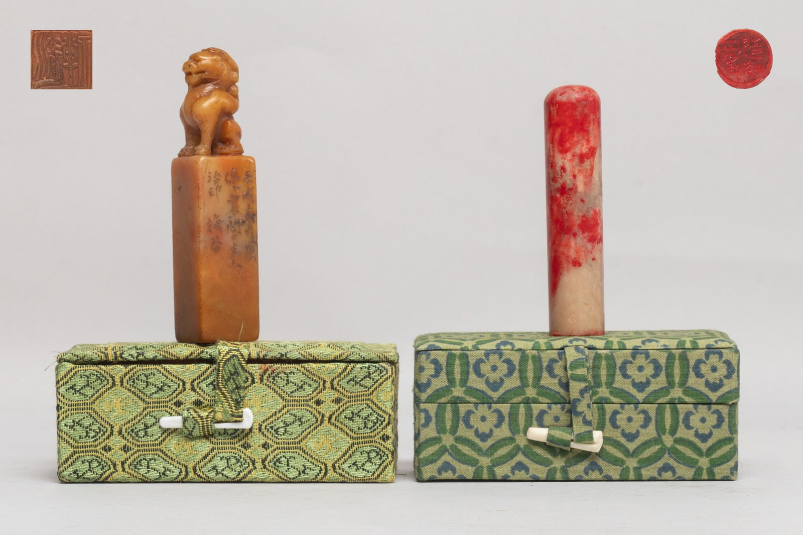 Estate Two Chinese Stone Seals: One seal of cylindrical form, the other of square section surmounted with a crouching beast, with boxes. Approx. 3.2*0.7*0.7 inch (larger seal size).