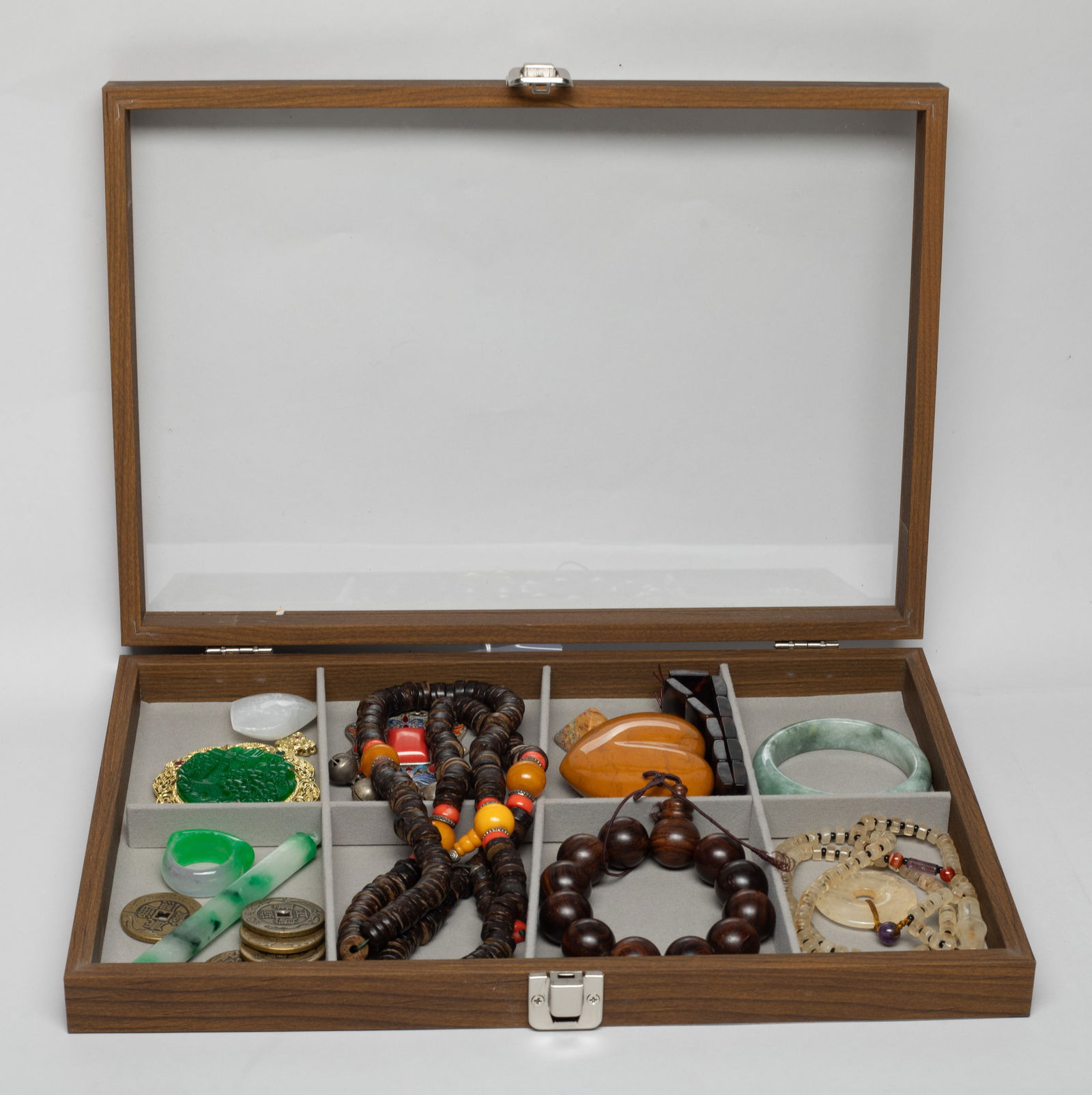 Estate Set Chinese Export Jewelry: Including necklaces, pendants, coin form decors, bead bracelets, stone carvings, a thumb ring, a bangle, with case. Approx. 34 inch L (longest necklace).