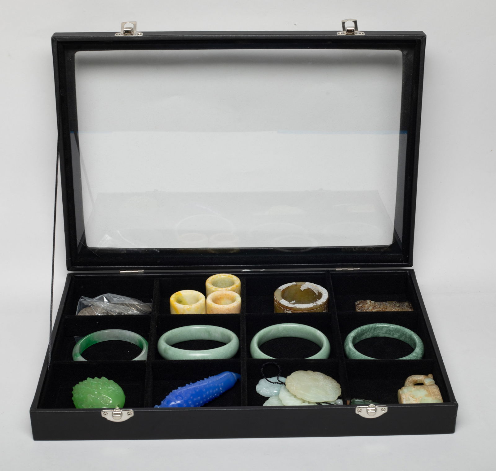 Chinese Fengshui Coins, Glass Stone Carving: Including four bangles, three thumb rings, two snuff bottles of melon or litchi form, Fengshui coins, and stone carvings, with case. Approx. 2.97 inch outer diameter, 2.3 inch inner diameter (largest