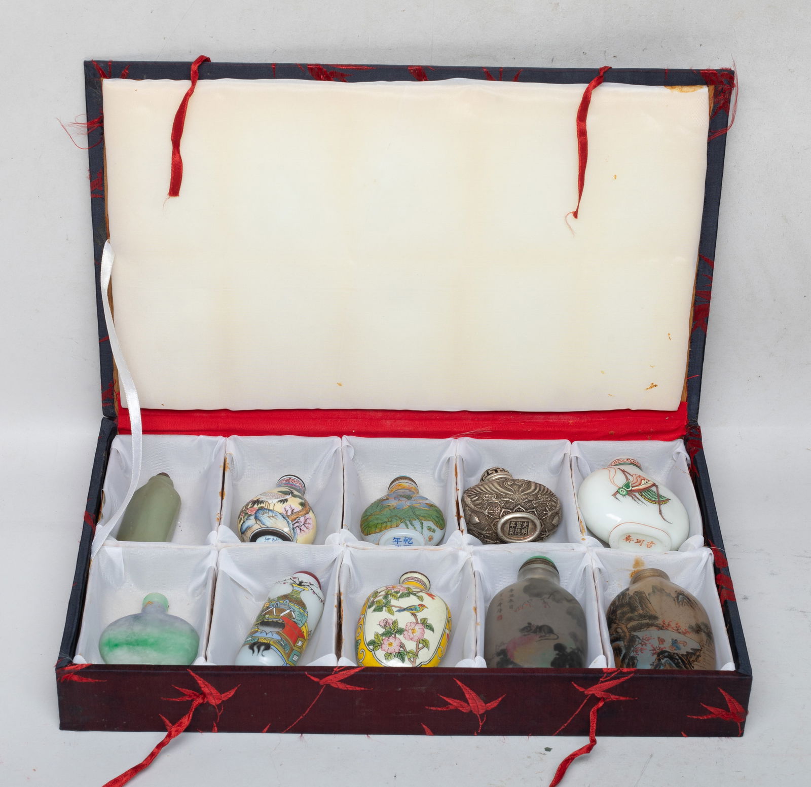 Estate Set Chinese Snuff Bottles Collection: Ten snuff bottles: one enameled with grasshoppers, marked three characters on the bottom; one painted landscape on the inside; one painted mice and fruits on the inside; one enameled flowers and butte