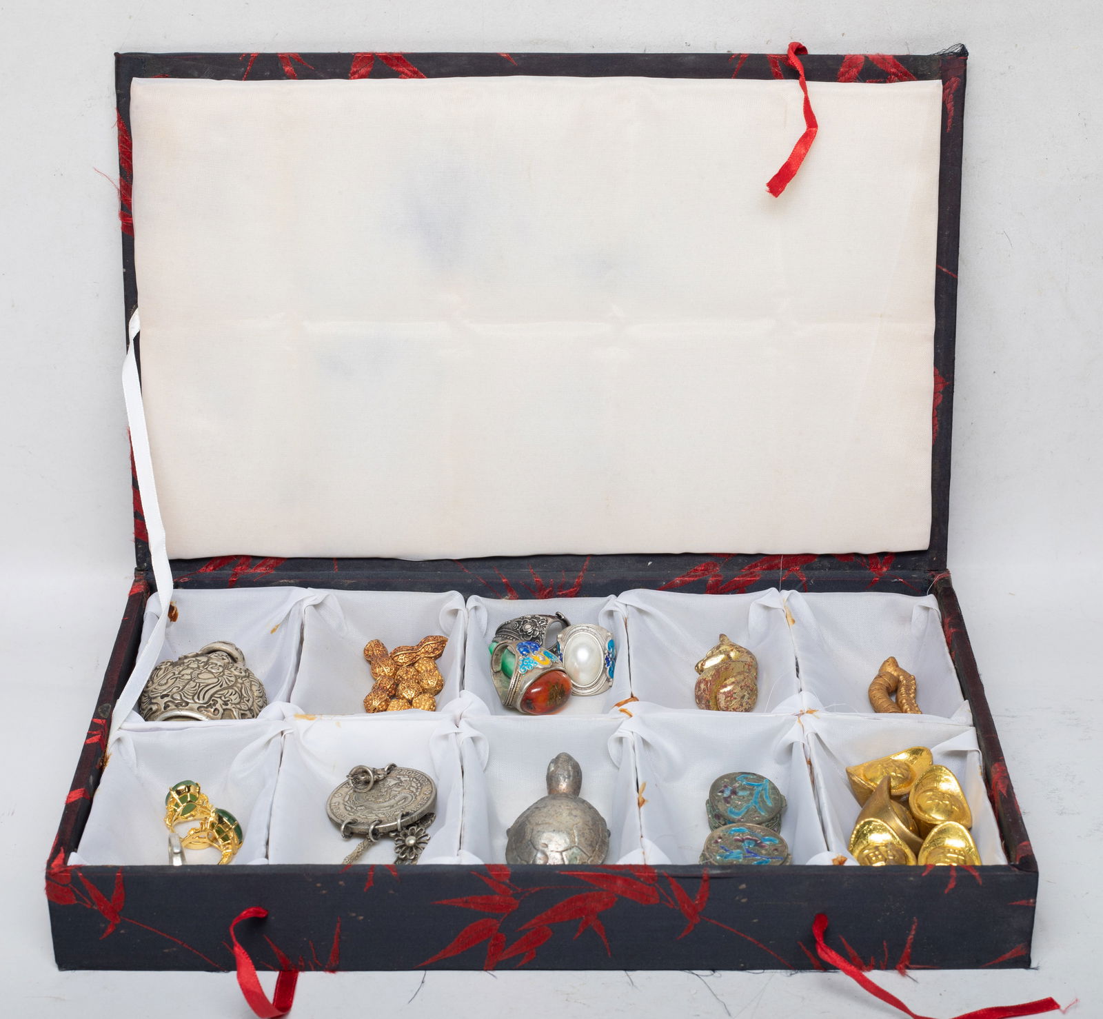 Estate Set Chinese Export Jewelry, Decors: Including a snuff bottle, a turtle sculpture, a toggle, hooks, rings, sculptures of peanut, ingot, or caterpillar form, with case. Size varies.
