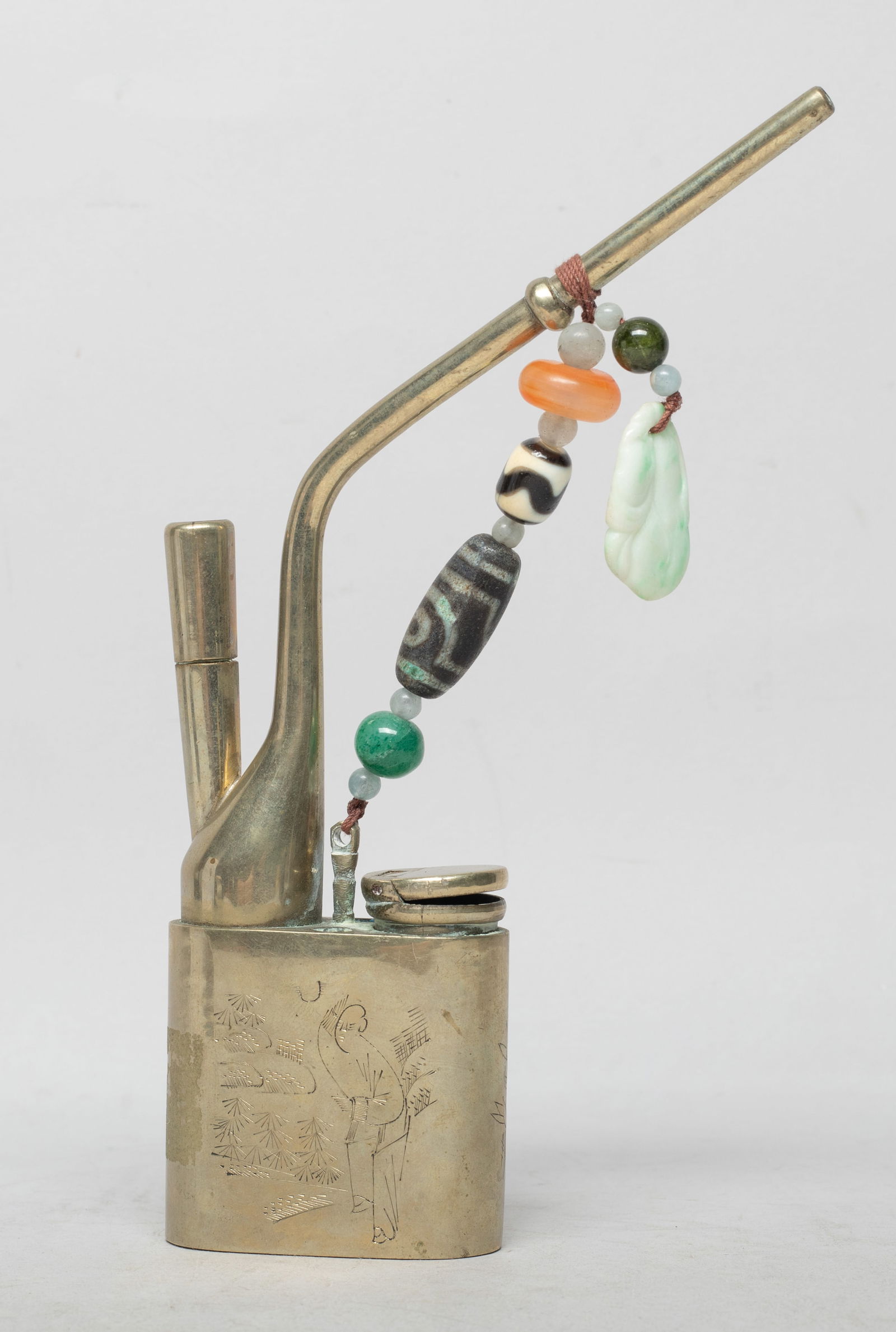 Estate Chinese Jade, Stone, Brass Pipe: Chinese vintage brass pipe, incised with a figure in landscape, decorated with stone beads and a flower from jade pendant. Approx. 7.2*4.5*1 inch.