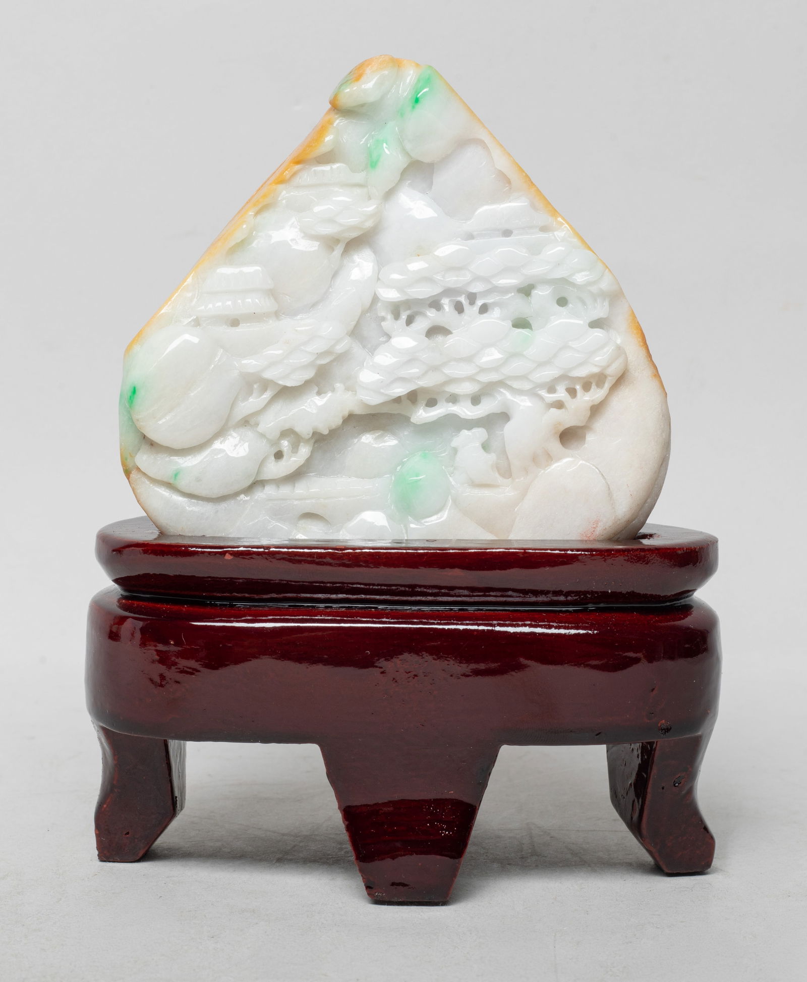 Vintage Chinese Export Jade Jadeite Sculpture: Of irregular shape, Carved in varying levels of relief as a craggy mountainscape, to one side with a sage travelling along a mountain path beneath a pine tree, with stand. Approx. 3.9*3.8*1.6 inch (w/