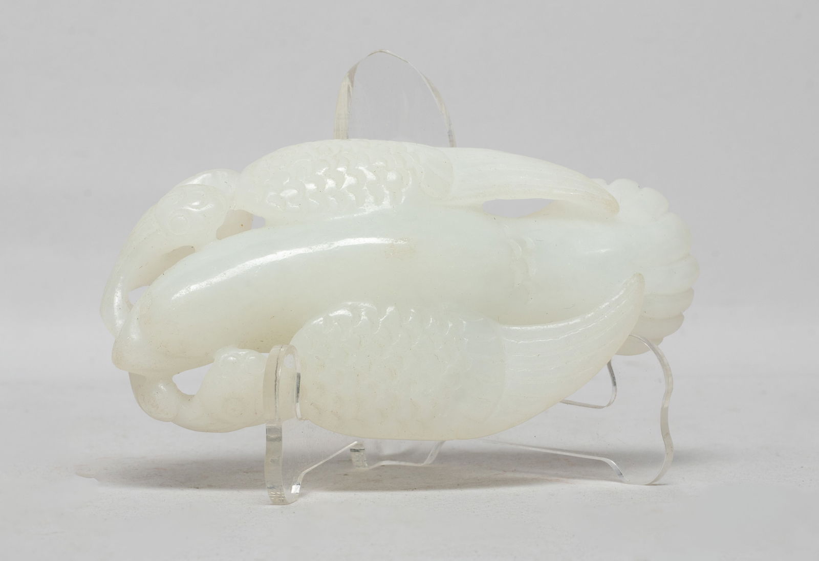 Chinese Jade/ Stone Carved Pendant: Large Chinese white jade / stone pendant, carved as a bird grasping a leafy stem issuing lotus seedpods. Approx. 4.2*2.3*0.9 inch.