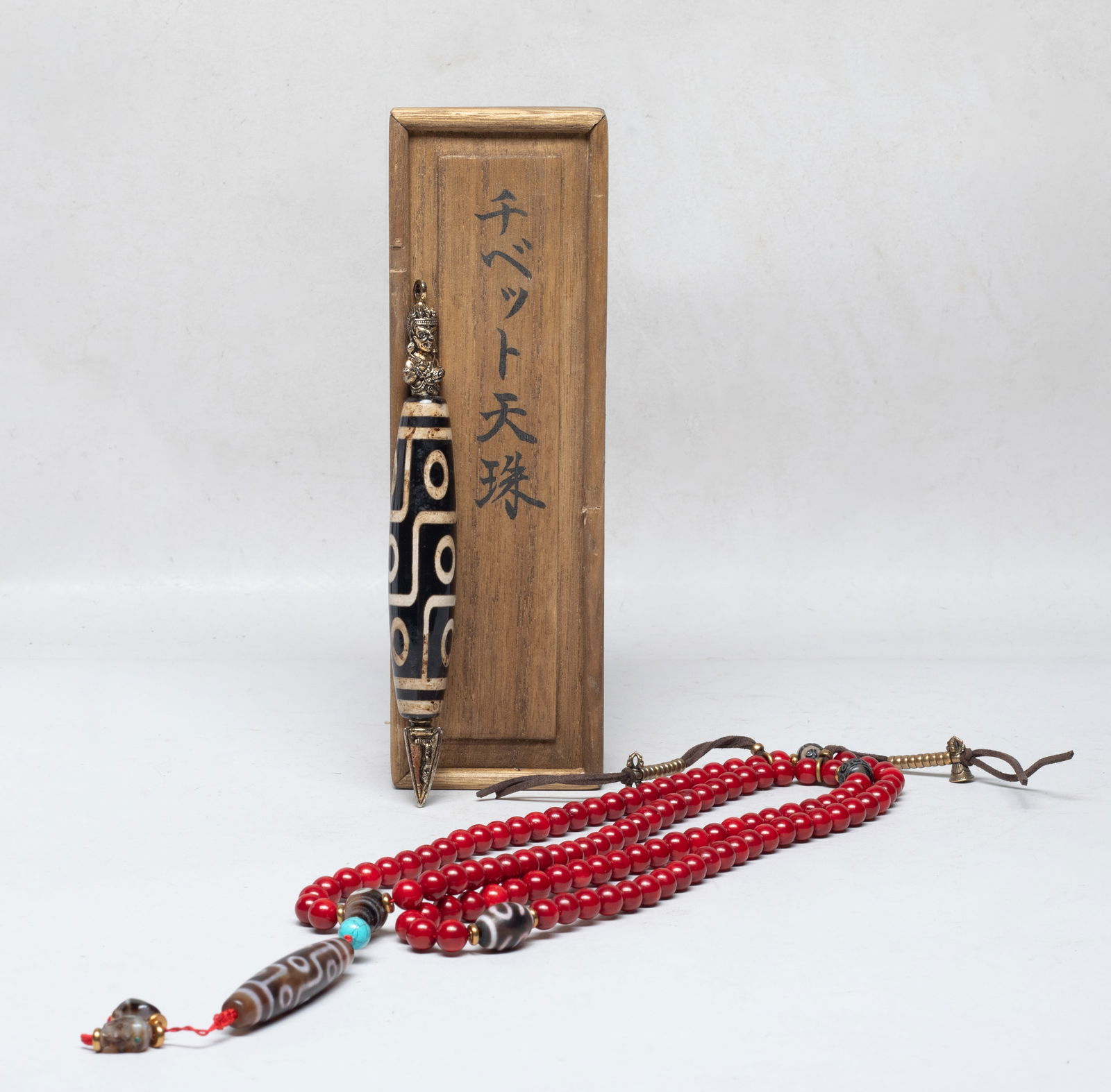 Two Chinese Export Beads Like Piece: Including a red bead necklace with dzi-bead-like beads, and a large dzi-bead-like decor with box. Approx. 6.4*0.8 inch (decor size).