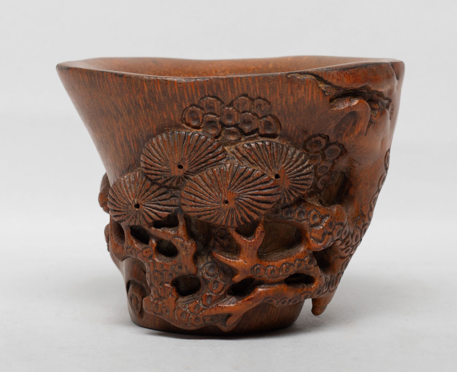 Estate Chinese Bamboo Carved Sculpture: The exterior carved in high relief with gnarled pine tree, a fox emerging from the trunk. Approx. 3.9*3.4*2.9 inch.