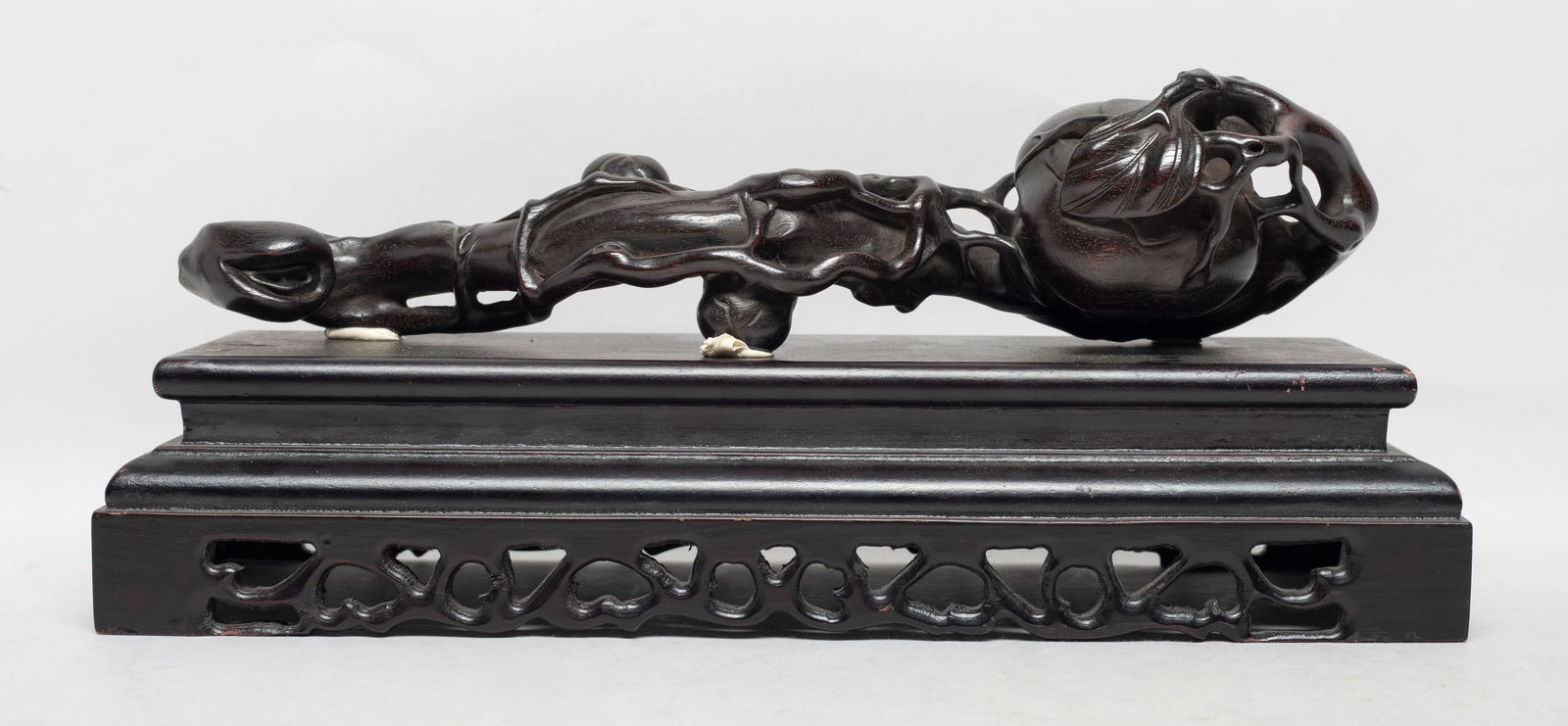 Chinese Wood Sculpture of Ruyi: The scepter naturalistically worked in the form of a stem, the minor persimmons issuing from a thick gnarled branch, ending with a large persimmon, with a rectangular base. Approx. 11*4*4.5 inch (w/