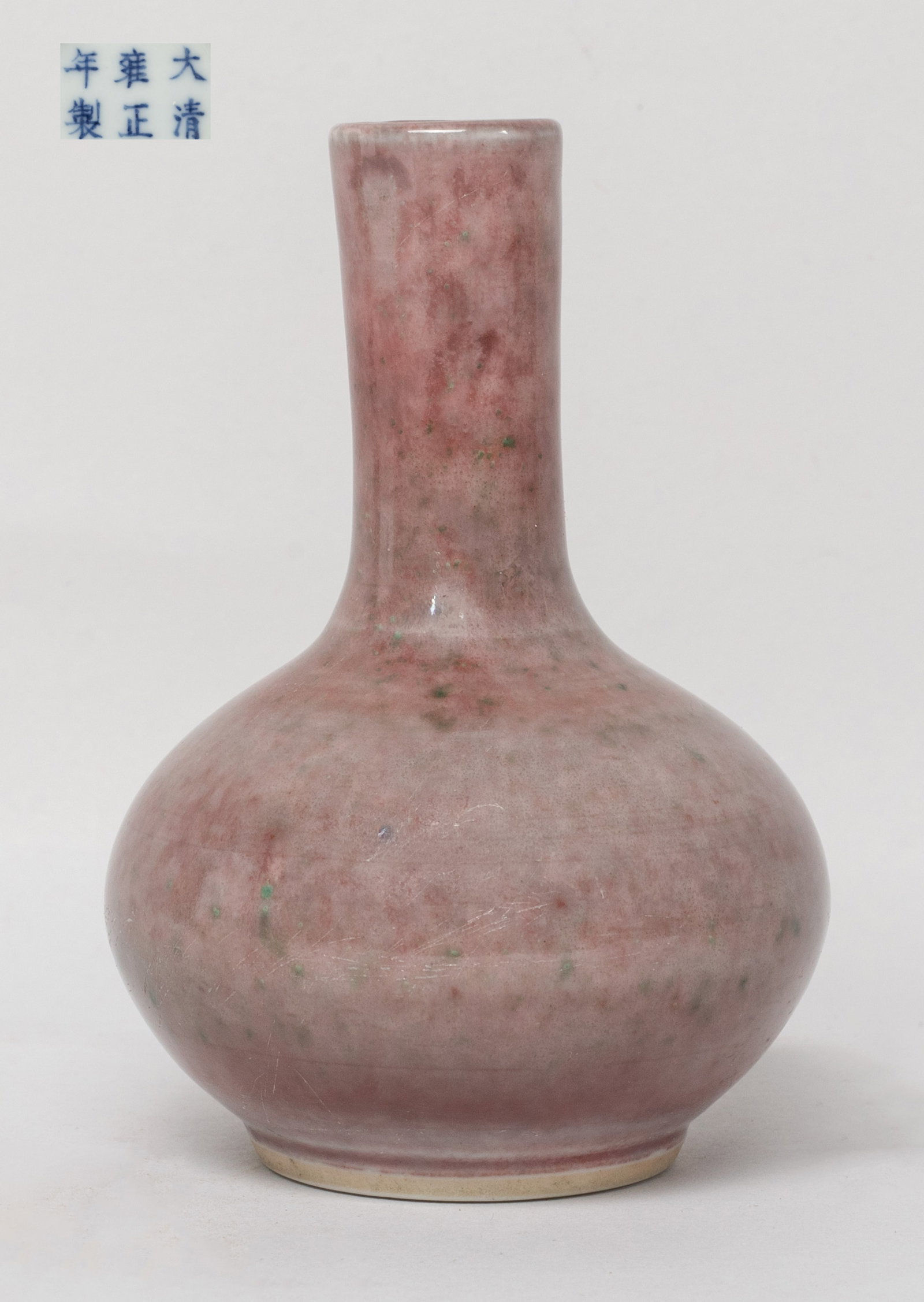 Chinese Flambe Glazed Porcelain Small Vase: Of compressed ovoid form with a cylindrical neck, the exterior covered in mottled reddish gray glaze with green inclusions, the bottom marked with six characters. Approx. 3.35*2.3 inch.