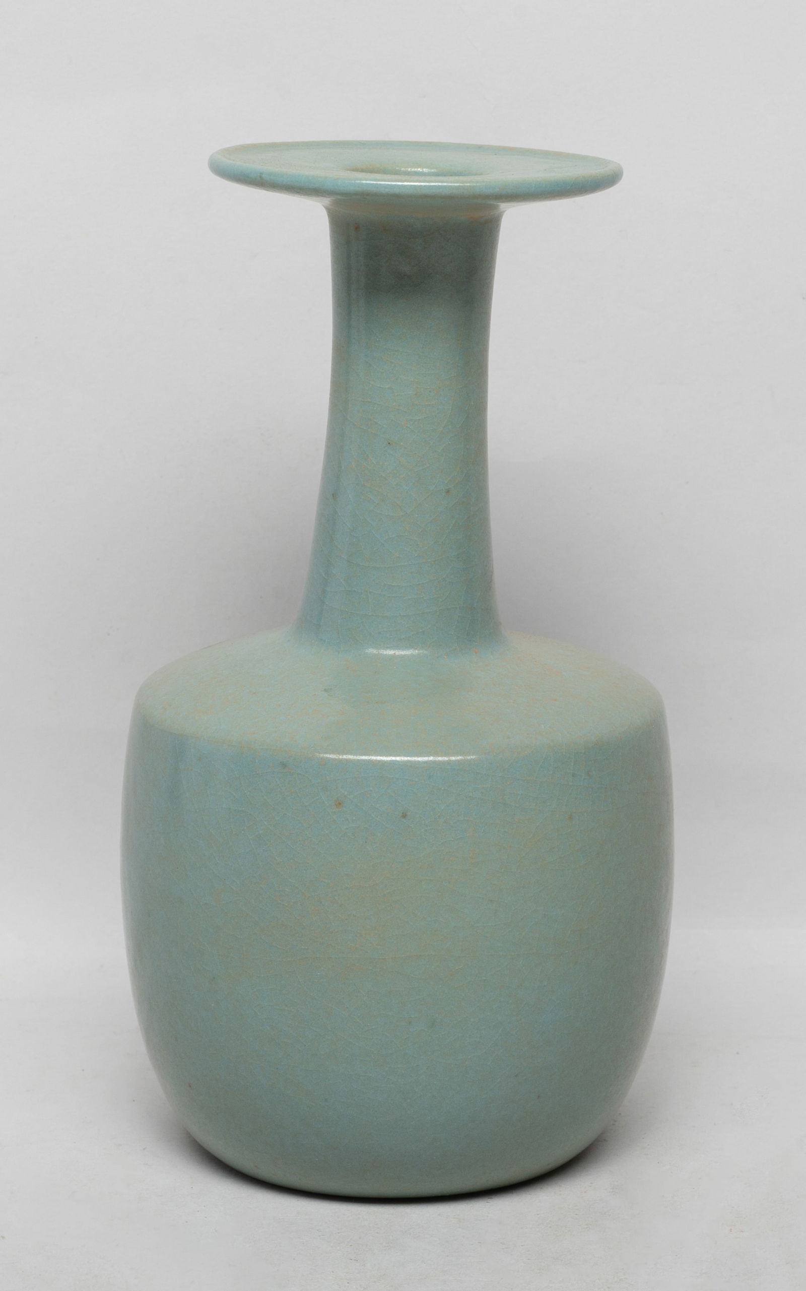 Chinese Ru Type Porcelain Vase: The cylindrical body rising to a columnar neck and a flat rim, overall covered with crackled bluish celadon glaze. Approx. 4*7.4 inch.