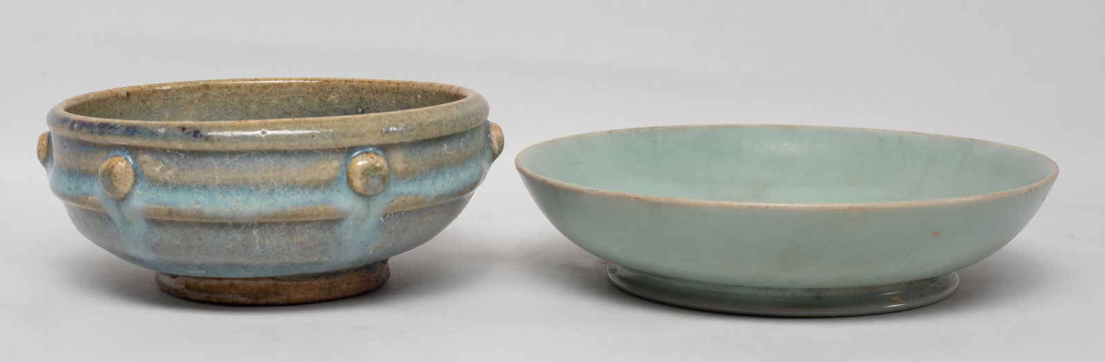 Estate Chinese Porcelain Tea Cup & Dish: The cup covered in crackled and bubbled milky blue glaze, the interior with purple-red splashes, the dish overall covered in celadon glaze. Approx. 4.7*1.9 inch.