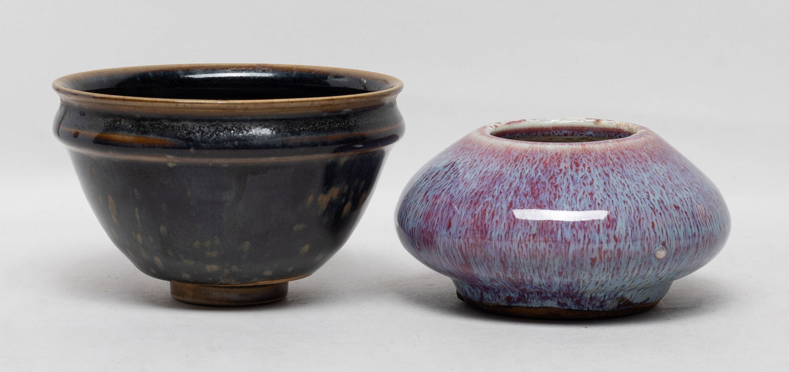 Estate Chinese Porcelain Bowl, Water Pot: The bowl applied in lustrous black glaze with brown splashes, the washer exterior covered in red glaze suffused with milky blue streaks, the interior covered in crackled and mottled beige glaze. Appro