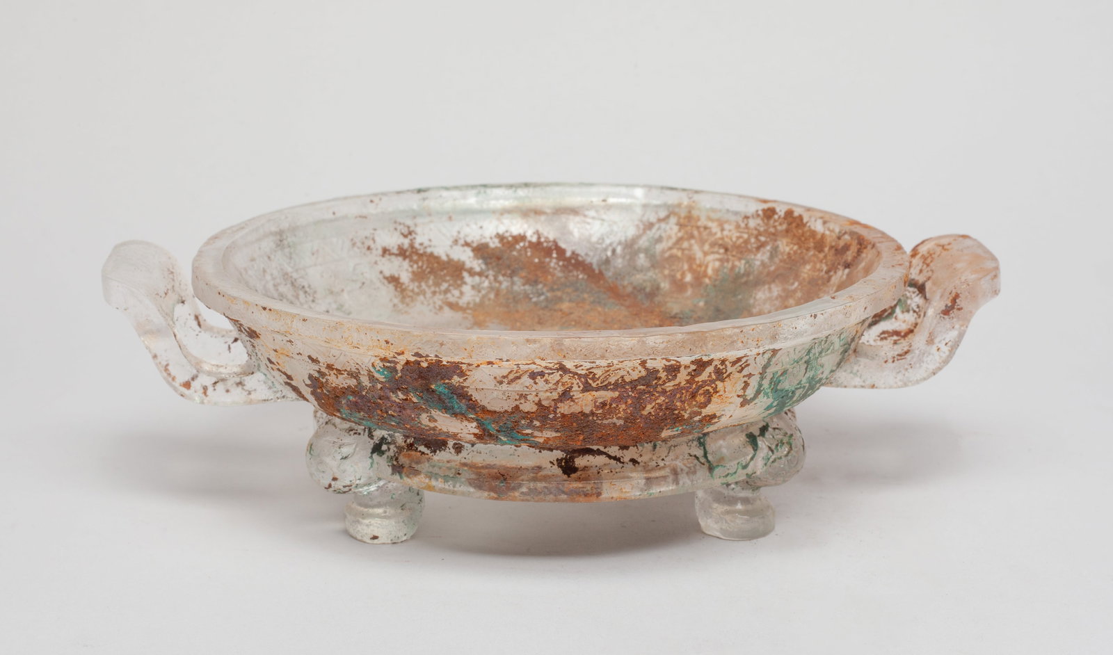 Rare Chinese Peiking Glass Tall Plate: Of shallow circular section, with two handles and three short legs, the interior centre carved in low relief with archaistic pattern, the exterior with a band of archaic scrolls. Approx. 7.6*6*2.2 inc