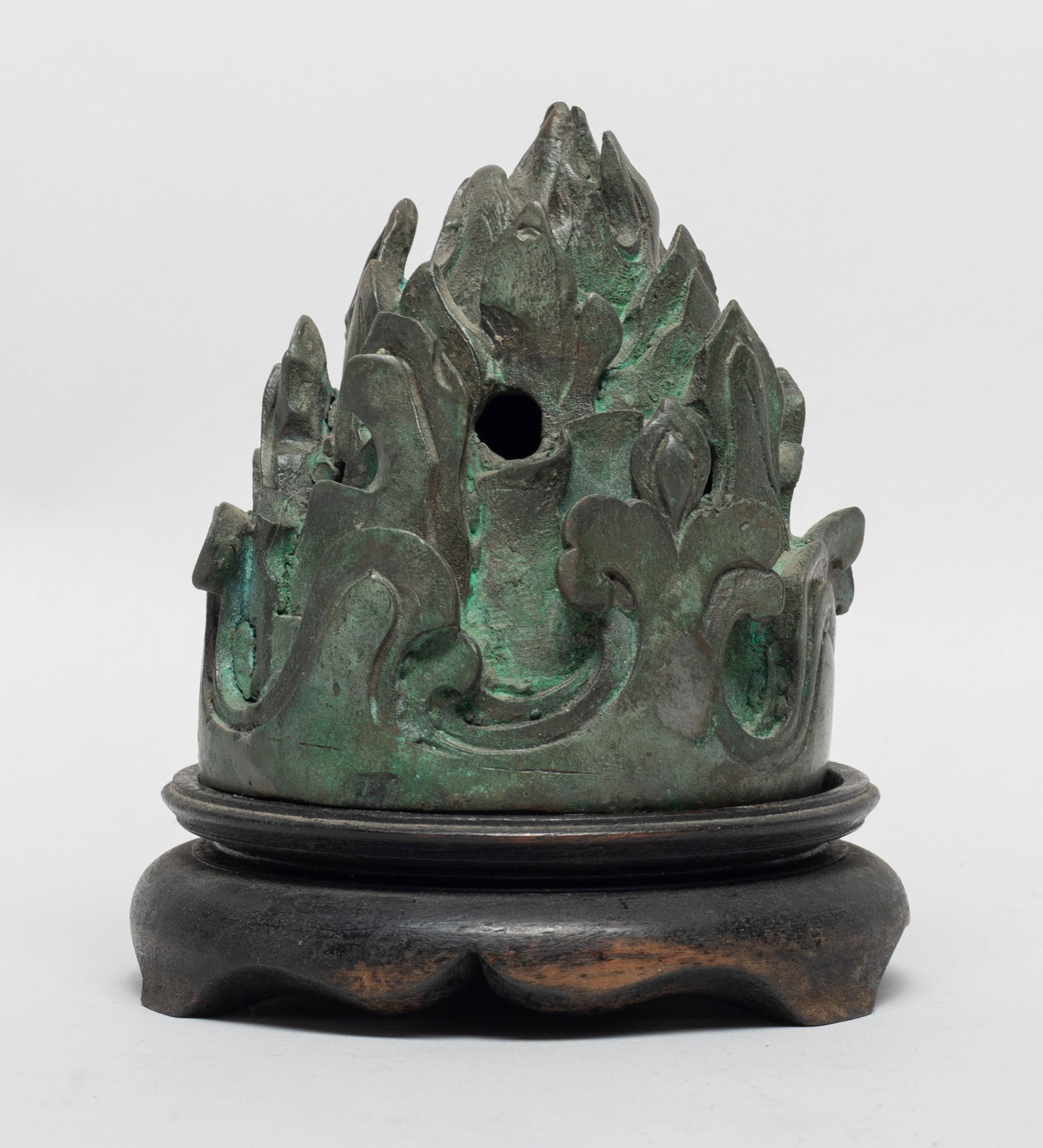 Estate Chinese Bronze Censer w/ Base: The bronze censer cast of conical form molded with raised mountain peaks, with a wood base. Approx. 4.7*4.3 inch. The Estate of the Store Closed Sale. Downtown. Los Angeles. 2021.