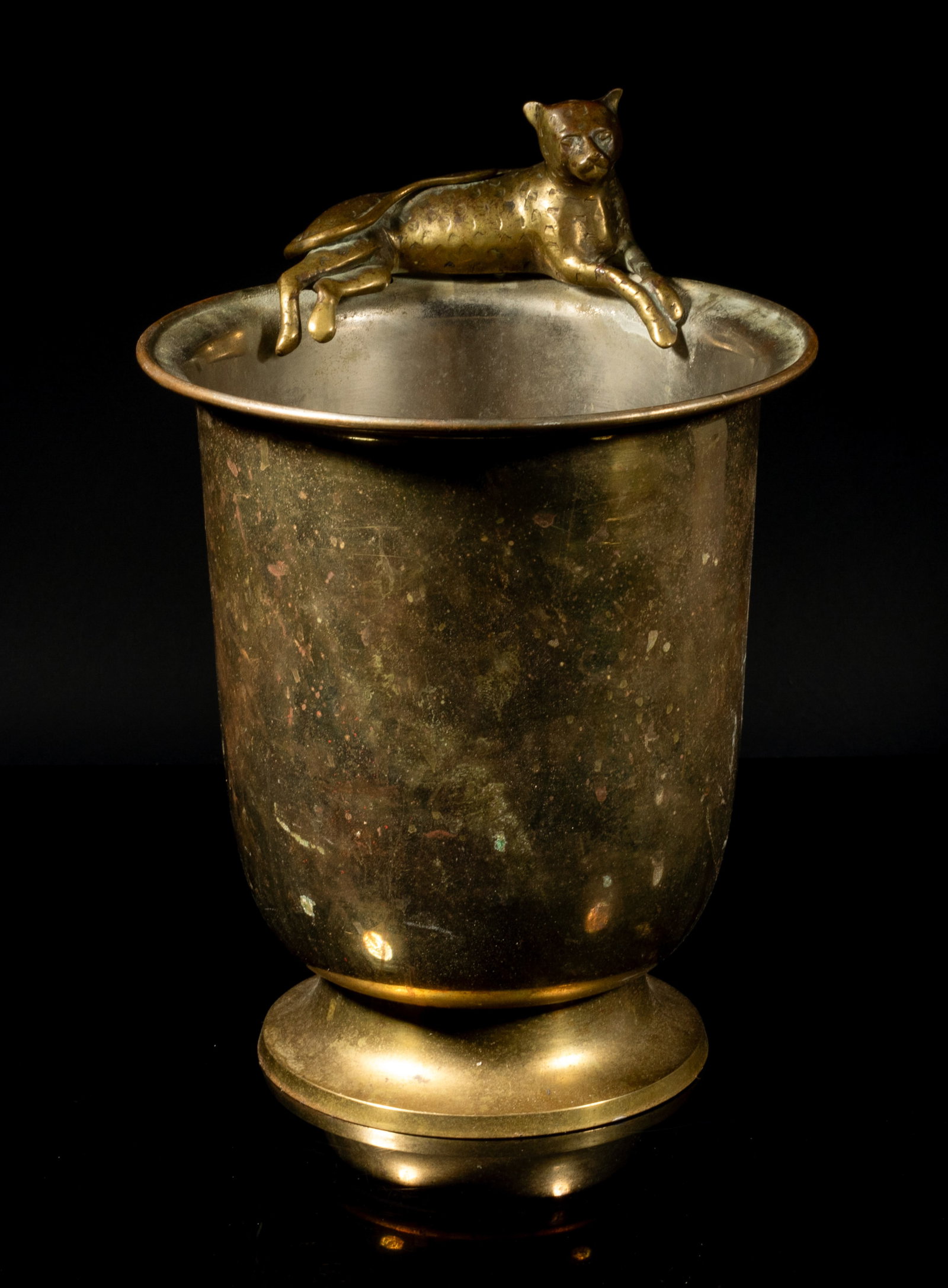 Antique Continental Brass Ice Pot: Of deep U shape with flared rim rising from a splayed foot, cast with a recumbent beast along the rim. Approx. 11.9*8.3 inch.