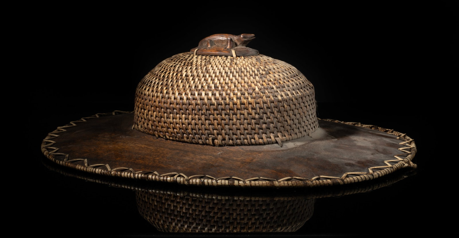 Large Wood & Rattan Helmet: Large wood and rattan helmet. Approx. 16.3*13.7*5 inch.