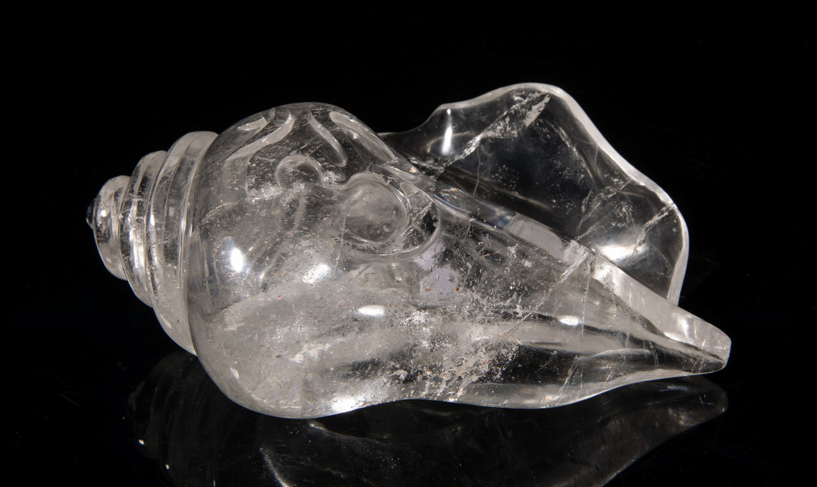 Rare Chinese/ Tibetan Rock Crystal Shell: Collectible large Chinese rock crystal sculpture carved of trumpet shell form. Approx. 7*5*2.8 inch. The Estate of the J & J Art. NYC, 2023.