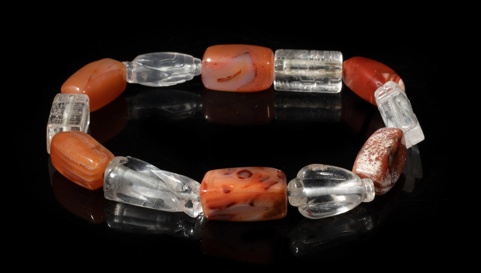 Chinese Early Cameo Agate, Crystal Bracelet: Chinese cameo agate and crystal bead bracelet, the crystal beads carved in form of figure or cicada, or incised with characters. Beads size varies.