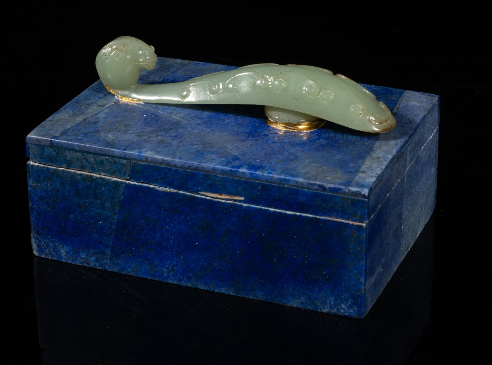 Rare Chinese Jade Handled Lapis Jewelry Box: Lapis jewelry box of rectangular section, decorated with a pale celadon jade hook on the top forming as a handle, the hook carved with with a beast head. Approx. 3.8*2.7*2.1 inch. The Estate of the