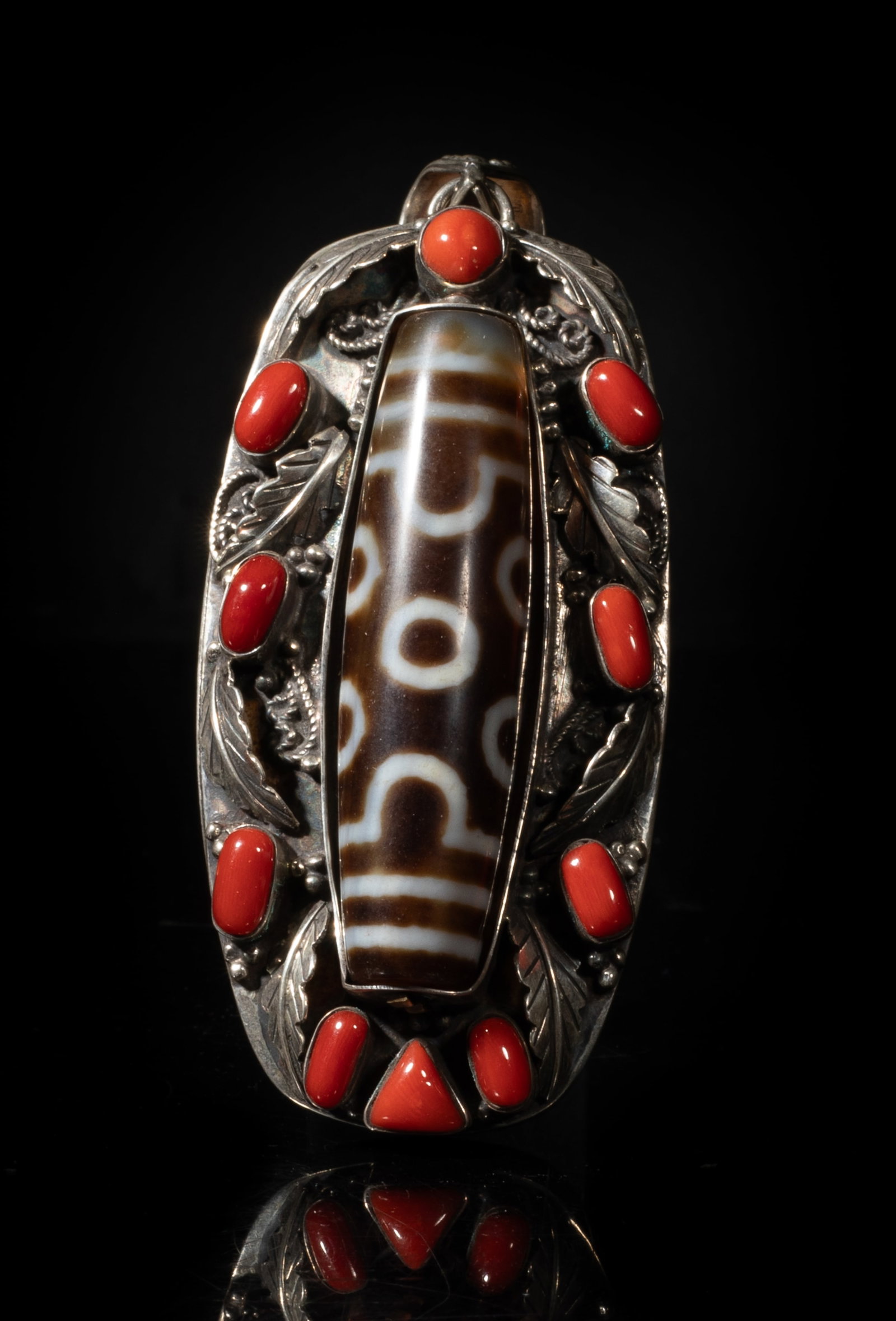 Heavy Chinese Sterling, Dzi Beads Pendant: Large heavy Chinese sterling silver pendant, carved with leaves, inlaid with red gemstone and a dzi bead. Approx. 3.6*1.57 inch, 57 gram.