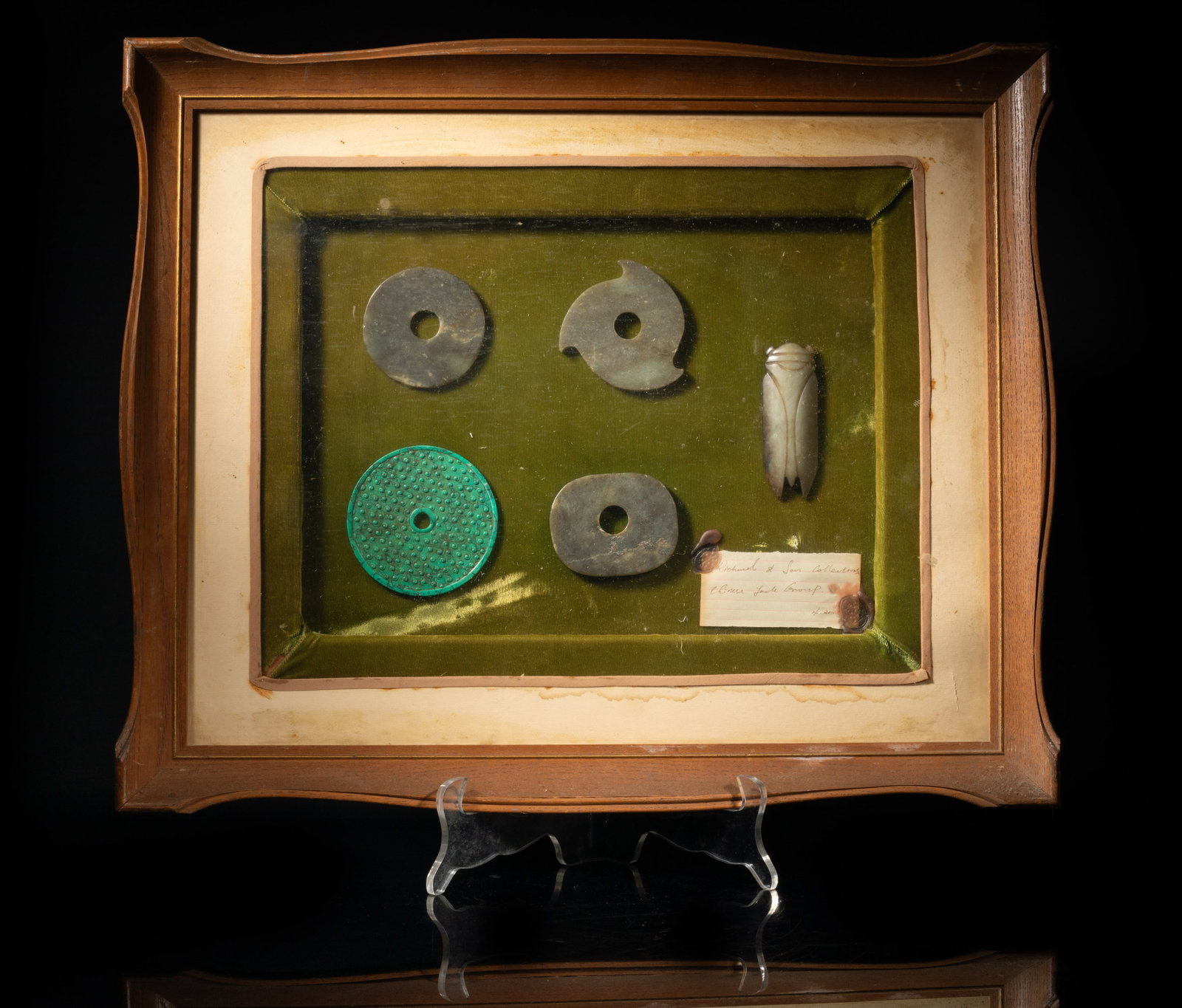 Set Chinese Jade, Stone w/ Wall Hanging Case: Set of five Chinese jade / stone carvings of disc or cicada form, fixed in a wall hanging case. Approx. 22.8*18.7 inch (case size).