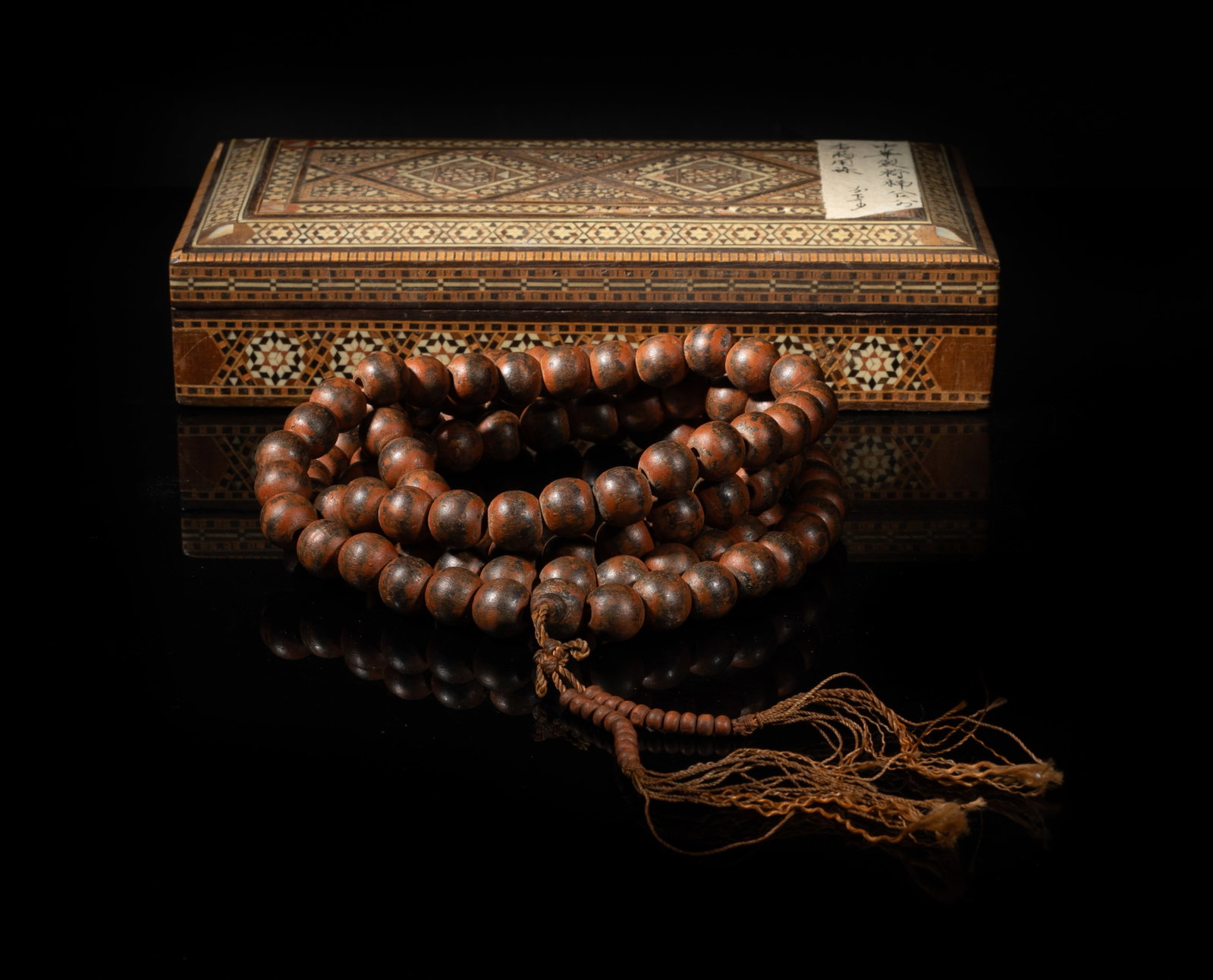 Chinese Agarwood Long Prayer Beads: A long string of Chinese agarwood prayer beads, slightly fragrant, with box. Approx. 57 inch L.