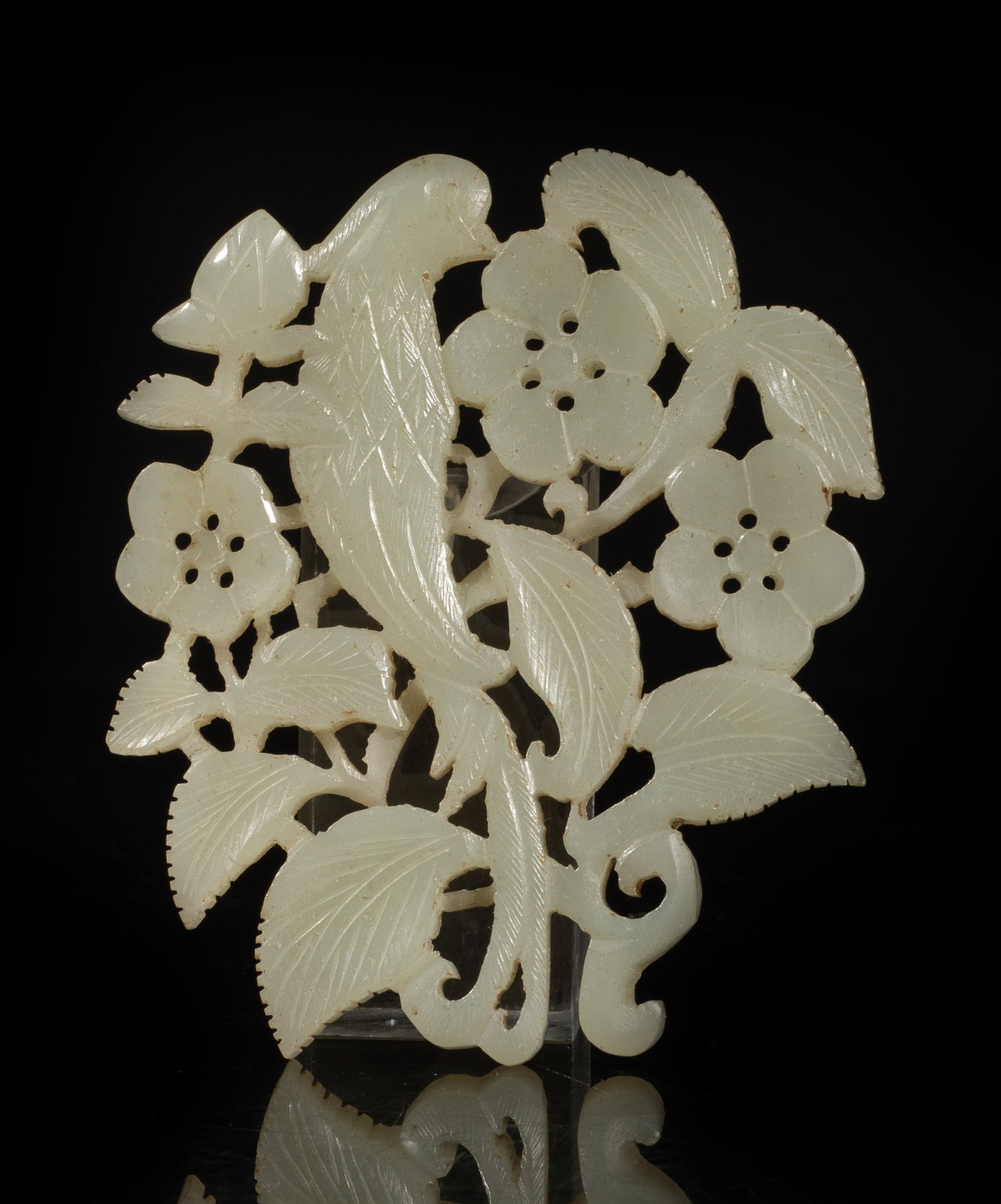 Chinese Sung Type Jade Carved Plaque: Chinese pale celadon jade plaque carved in openwork with a bird among leafy stems issuing flowers and bud. Approx. 3.17*2.67 inch. The Estate of the Ales. F. Hung. HK. 2002.