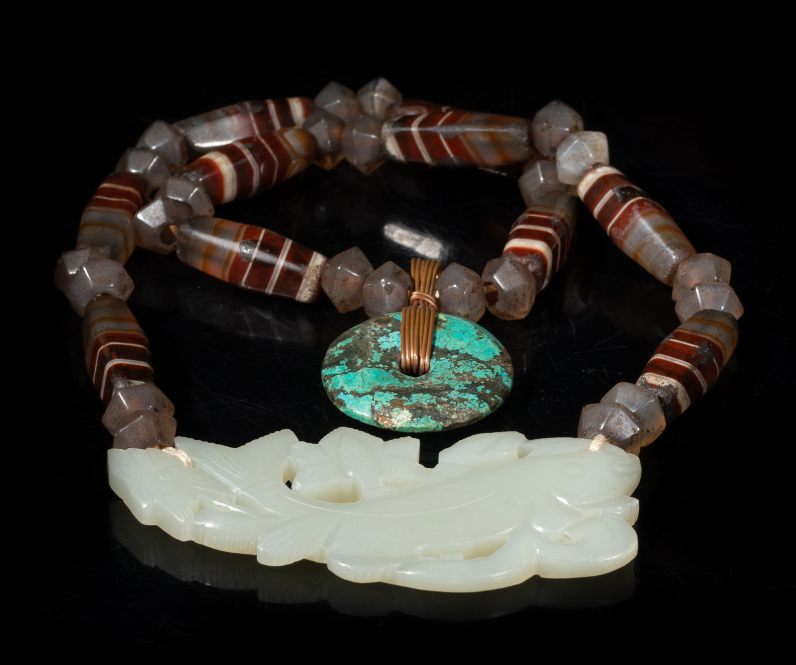 Chinese Jade, Turquoise, Agate Necklace: Chinese agate bead necklace, with a turquoise disc, and a jade pendant carved in openwork with a fish grasping a leafy twig in mouth. Approx. 3.3*1.5 inch (jade size).