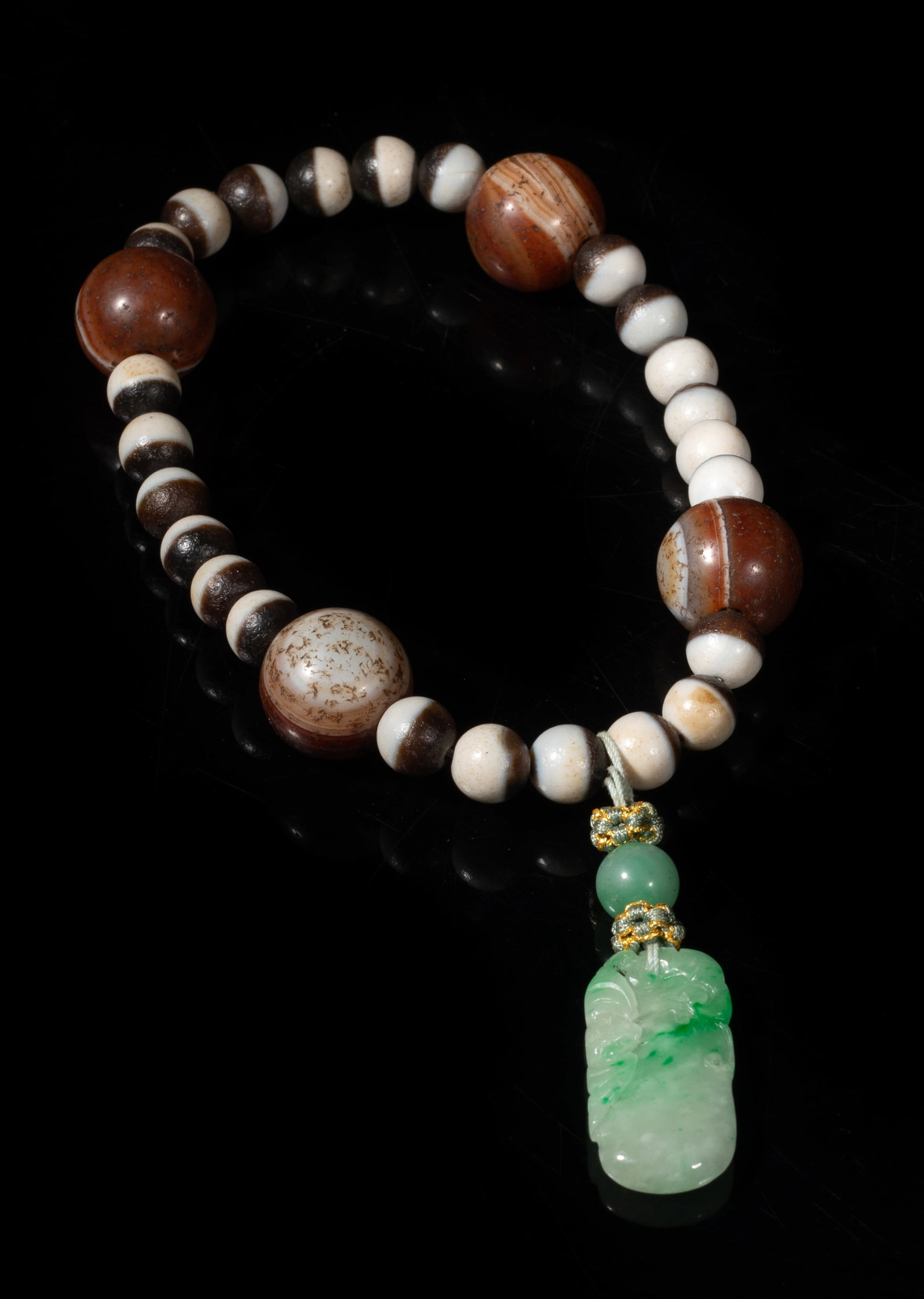 Rare Chinese Jade, Banded Medicine Agate Beads: A string of Chinese banded agate beads, suspended with a stone bead and a jade pendant carved with lingzhi, bat and gourd. Approx. 1.4*0.7 inch (jade size).