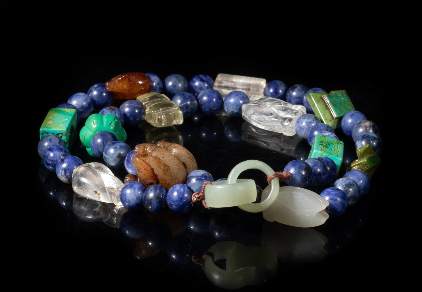 Chinese Lapis, Jade, Stone Mixed Necklace: Chinese lapis bead necklace, with stone beads, crystal pendants, and jade pendants. Approx. 24 inch L.