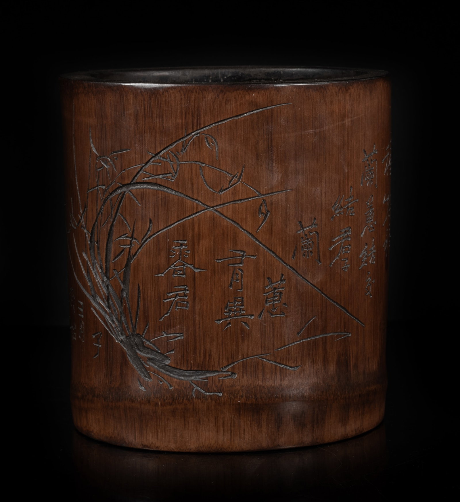 Chinese Bamboo Carved Brush Pot: The bamboo brush pot exterior carved with orchid and related poems. Approx. 6*5.5*5 inch. The Estate of the Grayson Mars, Los Angeles. 2013.