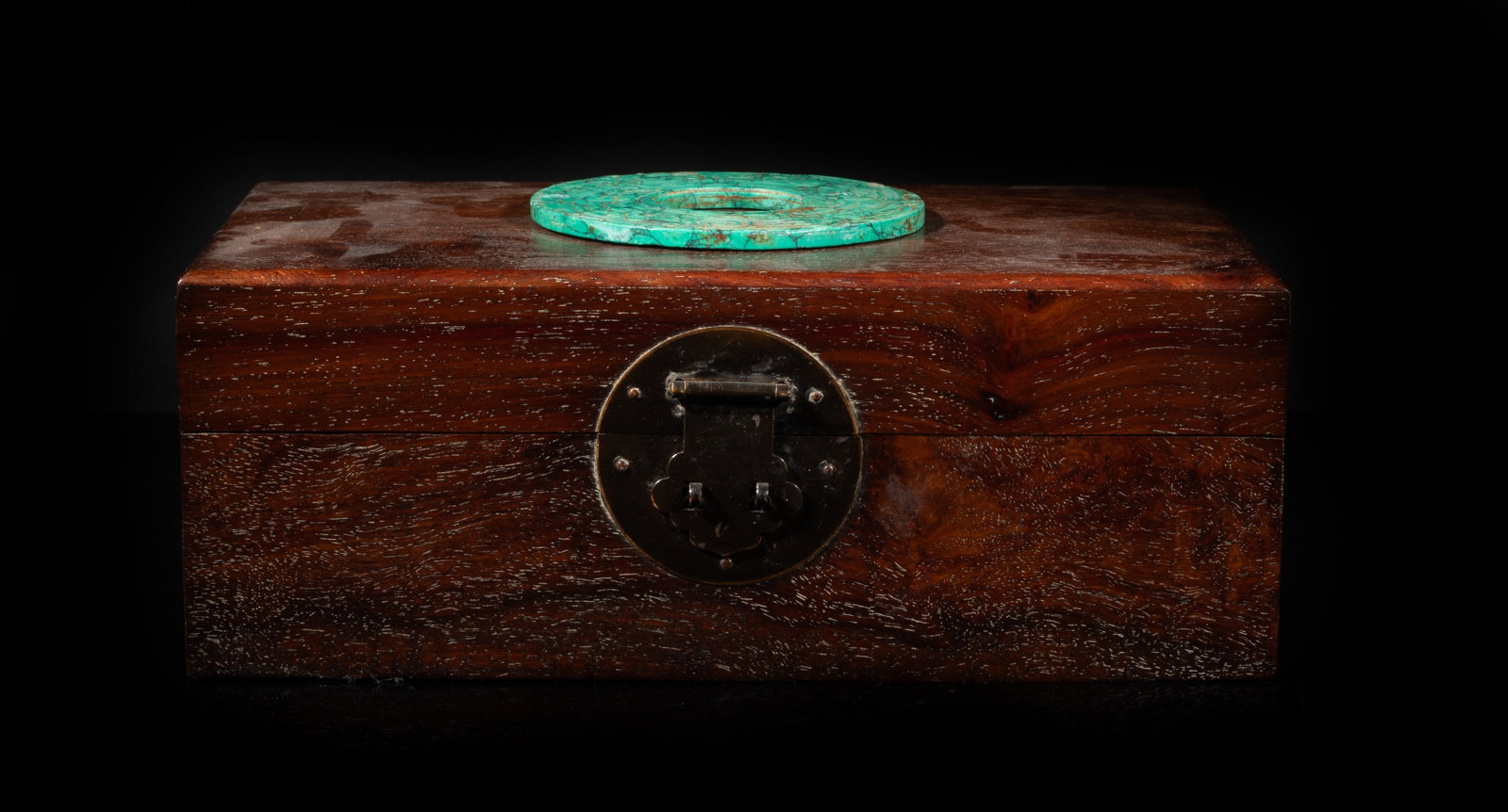 Chinese Export Wood Storage Box: Collectible Chinese wood storage box inlaid with a stone disc incised with stylized beasts. Approx. 9.7*5.7*4 inch.